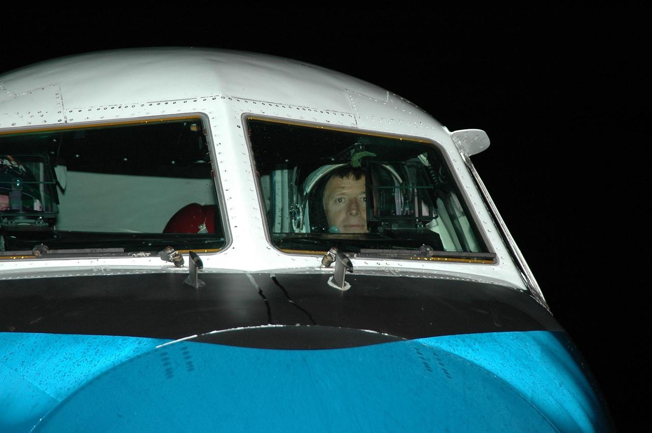 KENNEDY SPACE CENTER, FLA. - STS-115 Pilot Christopher Ferguson settles in the cockpit of the Shuttle Training Aircraft to practice landing the shuttle. STA practice is part of launch preparations. The STA is a Grumman American Aviation-built Gulf Stream II jet that was modified to simulate an orbiter’s cockpit, motion and visual cues, and handling qualities. In flight, the STA duplicates the orbiter’s atmospheric descent trajectory from approximately 35,000 feet altitude to landing on a runway. Because the orbiter is unpowered during re-entry and landing, its high-speed glide must be perfectly executed the first time. Mission STS-115 is scheduled to lift off about 12:29 p.m. Sept. 6. Mission managers cancelled Atlantis' first launch campaign due to a lightning strike at the pad and the passage of Tropical Storm Ernesto along Florida's east coast. The mission will deliver and install the 17-and-a-half-ton P3/P4 truss segment to the port side of the integrated truss system on the orbital outpost. The truss includes a new set of photovoltaic solar arrays. When unfurled to their full length of 240 feet, the arrays will provide additional power for the station in preparation for the delivery of international science modules over the next two years. STS-115 is expected to last 11 days and includes three scheduled spacewalks. Photo credit: NASA/Kim Shiflett