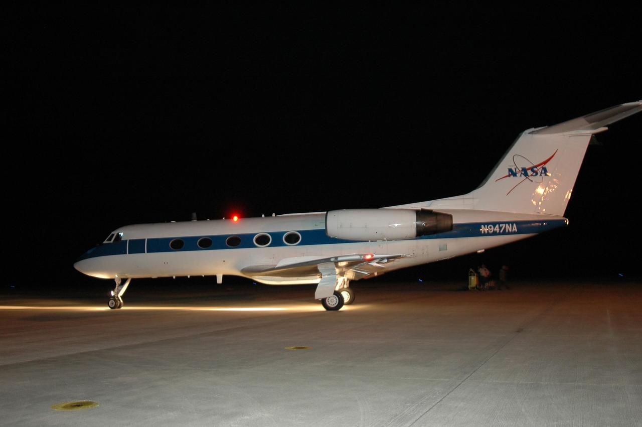 KENNEDY SPACE CENTER, FLA. - In the early morning hours on NASA Kennedy Space Center's Shuttle Landing Facility, the Shuttle Training Aircraft taxis onto the runway. In the specially configured aircraft, STS-115 Commander Brent Jett and Pilot Christopher Ferguson are practicing landing the shuttle. STA practice is part of launch preparations. The STA is a Grumman American Aviation-built Gulf Stream II jet that was modified to simulate an orbiter’s cockpit, motion and visual cues, and handling qualities. In flight, the STA duplicates the orbiter’s atmospheric descent trajectory from approximately 35,000 feet altitude to landing on a runway. Because the orbiter is unpowered during re-entry and landing, its high-speed glide must be perfectly executed the first time. Mission STS-115 is scheduled to lift off about 12:29 p.m. Sept. 6. Mission managers cancelled Atlantis' first launch campaign due to a lightning strike at the pad and the passage of Tropical Storm Ernesto along Florida's east coast. The mission will deliver and install the 17-and-a-half-ton P3/P4 truss segment to the port side of the integrated truss system on the orbital outpost. The truss includes a new set of photovoltaic solar arrays. When unfurled to their full length of 240 feet, the arrays will provide additional power for the station in preparation for the delivery of international science modules over the next two years. STS-115 is expected to last 11 days and includes three scheduled spacewalks. Photo credit: NASA/Kim Shiflett