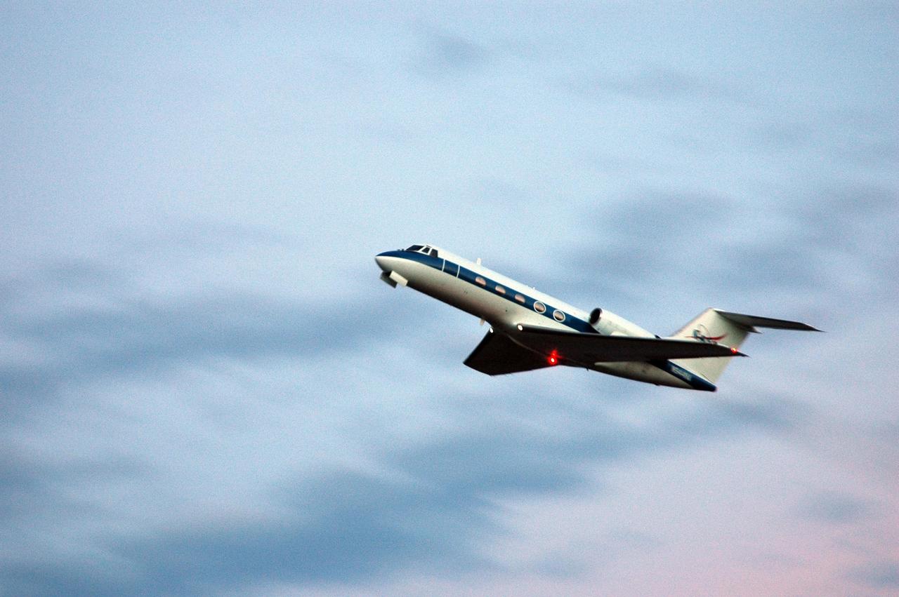 KENNEDY SPACE CENTER, FLA. - On NASA Kennedy Space Center's Shuttle Landing Facility, the Shuttle Training Aircraft takes to the skies. In the specially configured aircraft, STS-115 Commander Brent Jett and Pilot Christopher Ferguson are practicing landing the shuttle. STA practice is part of launch preparations. The STA is a Grumman American Aviation-built Gulf Stream II jet that was modified to simulate an orbiter’s cockpit, motion and visual cues, and handling qualities. In flight, the STA duplicates the orbiter’s atmospheric descent trajectory from approximately 35,000 feet altitude to landing on a runway. Because the orbiter is unpowered during re-entry and landing, its high-speed glide must be perfectly executed the first time. Mission STS-115 is scheduled to lift off about 12:29 p.m. Sept. 6. Mission managers cancelled Atlantis' first launch campaign due to a lightning strike at the pad and the passage of Tropical Storm Ernesto along Florida's east coast. The mission will deliver and install the 17-and-a-half-ton P3/P4 truss segment to the port side of the integrated truss system on the orbital outpost. The truss includes a new set of photovoltaic solar arrays. When unfurled to their full length of 240 feet, the arrays will provide additional power for the station in preparation for the delivery of international science modules over the next two years. STS-115 is expected to last 11 days and includes three scheduled spacewalks. Photo credit: NASA/Kim Shiflett