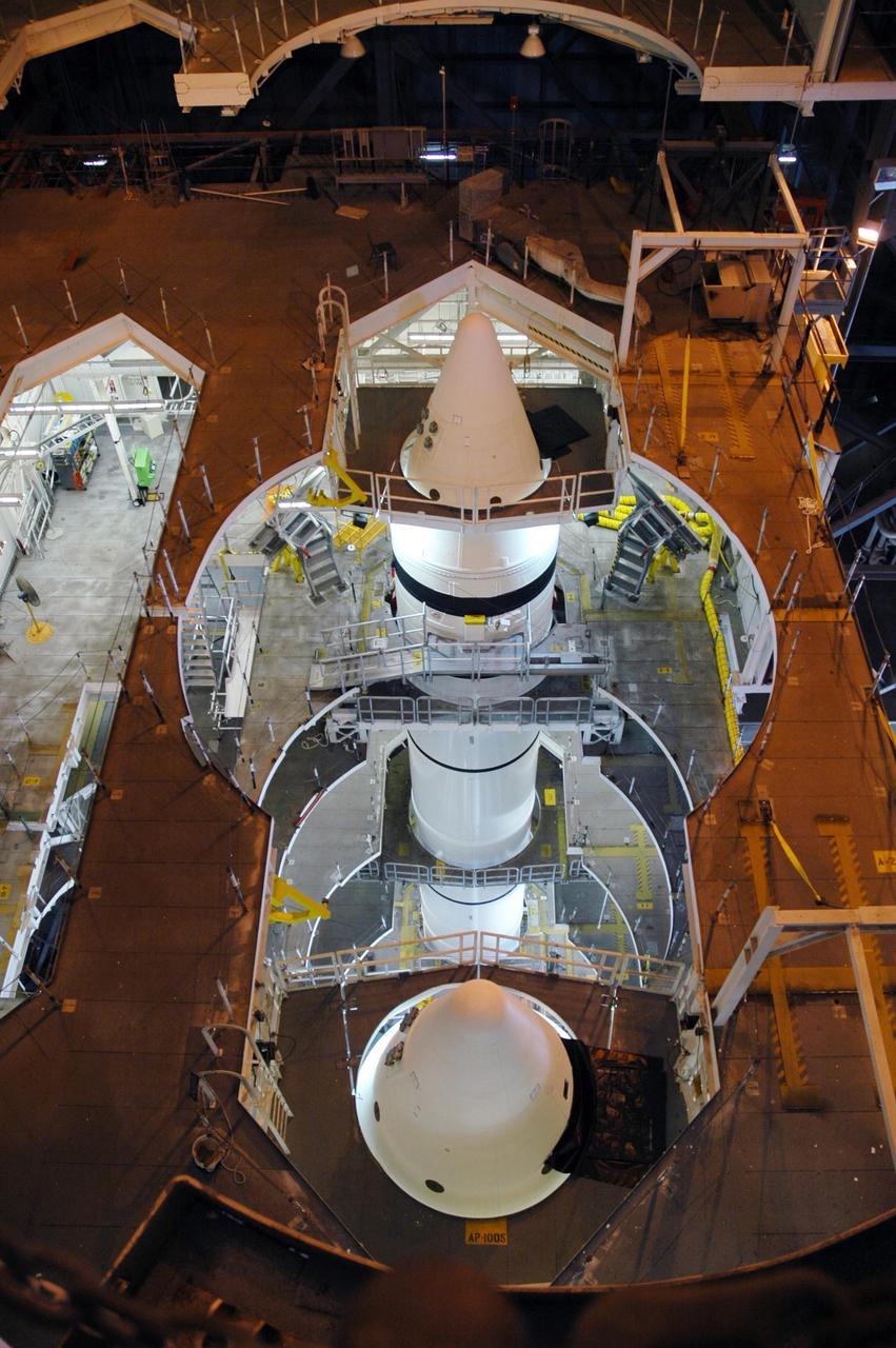 KENNEDY SPACE CENTER, FLA. -  From this unique view on an upper level of the Vehicle Assembly Building, the solid rocket boosters (SRBs) are seen being stacked for the orbiter Discovery and mission STS-116. Discovery will be rolling over to the VAB in early November to be stacked with the SRBs and external tank for launch. STS-116 will be mission number 20 to the International Space Station and construction flight 12A.1.  The mission payload is the SPACEHAB module, the P5 integrated truss structure and other key components.   Launch is scheduled for no earlier than Dec. 7.   Photo credit: NASA/Jack Pfaller