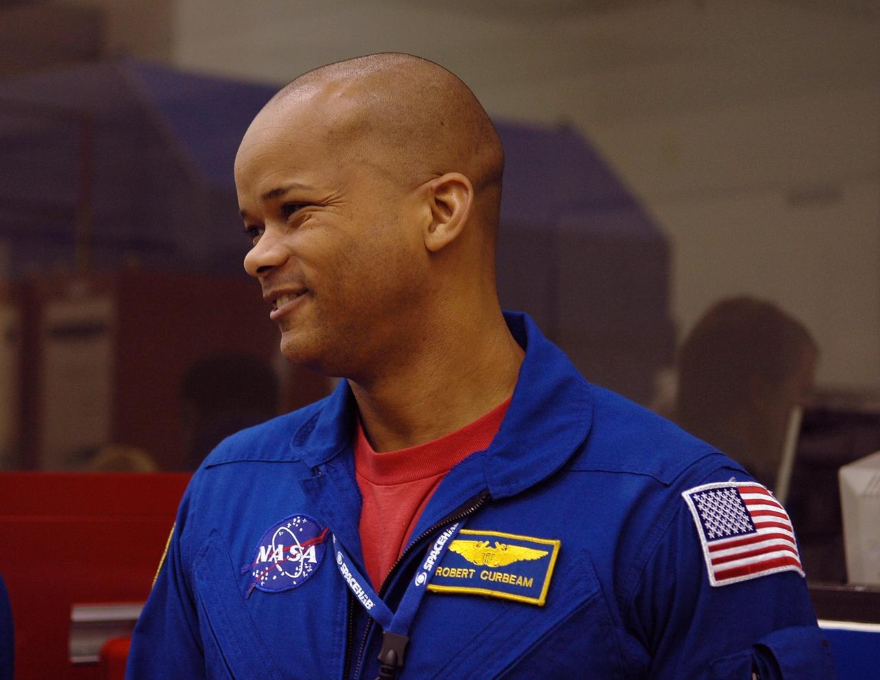 KENNEDY SPACE CENTER, FLA. -  STS-116 Mission Specialist Robert Curbeam arrives at the SPACEHAB Payload Processing Facility at Port Canaveral, Fla., to participate in the Crew Equipment Interface Test. Mission crews make frequent trips to the Space Coast to become familiar with the equipment and payloads they will be using. STS-116 will be mission No. 20 to the International Space Station and construction flight 12A.1. The mission payload is the SPACEHAB module, the P5 integrated truss structure and other key components.  Launch is scheduled for no earlier than Dec. 7.  Photo credit: NASA/Kim Shiflett