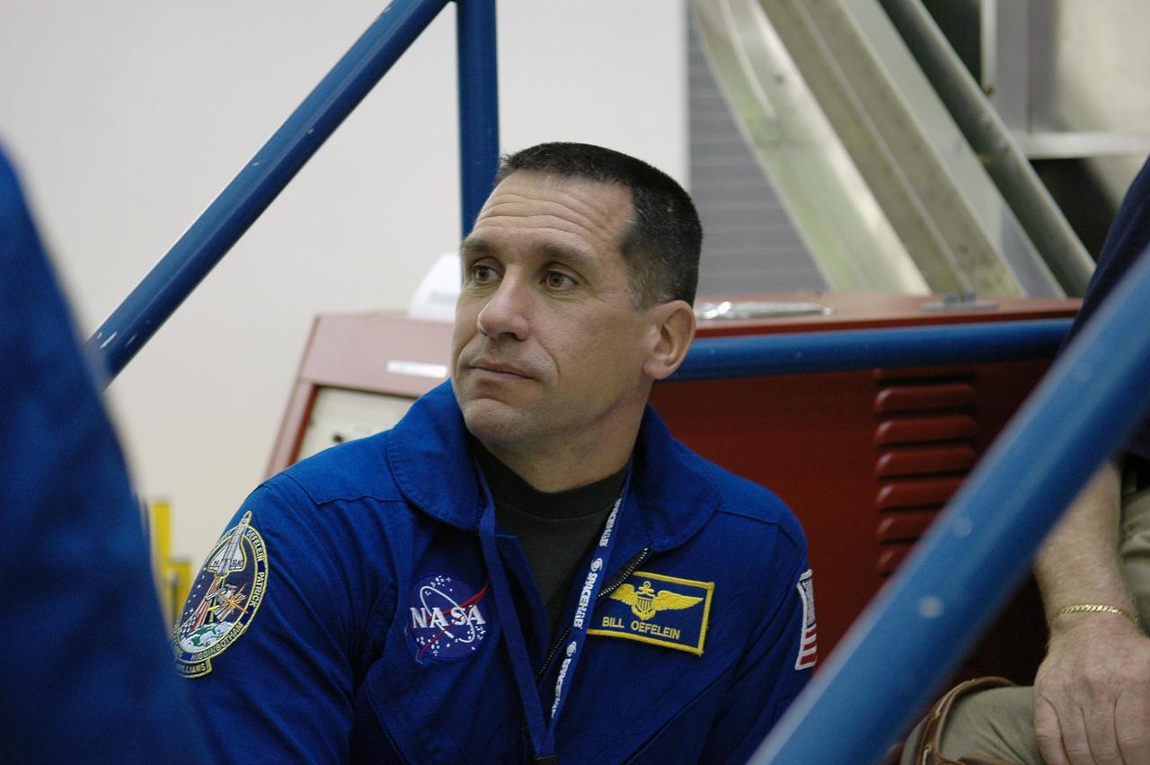 KENNEDY SPACE CENTER, FLA. -  STS-116 Pilot William Oefelein participates in the Crew Equipment Interface Test at the SPACEHAB Payload Processing Facility at Port Canaveral, Fla.  Mission crews make frequent trips to the Space Coast to become familiar with the equipment and payloads they will be using. STS-116 will be mission No. 20 to the International Space Station and construction flight 12A.1. The mission payload is the SPACEHAB module, the P5 integrated truss structure and other key components.  Launch is scheduled for no earlier than Dec. 7.  Photo credit: NASA/Kim Shiflett