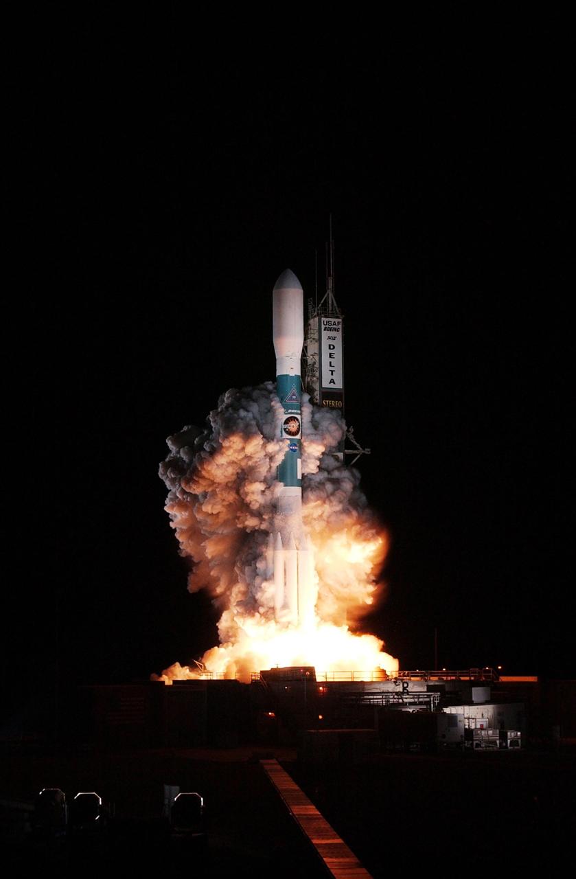 KENNEDY SPACE CENTER, FLA. - Just after liftoff, clouds of smoke billow up and around the Delta II rocket carrying the STEREO spacecraft on top.  Liftoff from Launch Pad 17-B at Cape Canaveral Air Force Station was at 8:52 p.m. EDT. STEREO (Solar Terrestrial Relations Observatory) is a two-year mission using two nearly identical observatories, one ahead of Earth in its orbit and the other trailing behind.  The duo will provide 3-D measurements of the sun and its flow of energy, enabling scientists to study the nature of coronal mass ejections and why they happen.  The ejections are a major source of the magnetic disruptions on Earth and are a key component of space weather.  The disruptions can greatly effect satellite operations, communications, power systems, humans in space and global climate.  Designed and built by the Johns Hopkins University Applied Physics Laboratory (APL) , the STEREO mission is being managed by NASA Goddard Space Flight Center. APL will maintain command and control of the observatories throughout the mission, while NASA tracks and receives the data, determines the orbit of the satellites, and coordinates the science results.