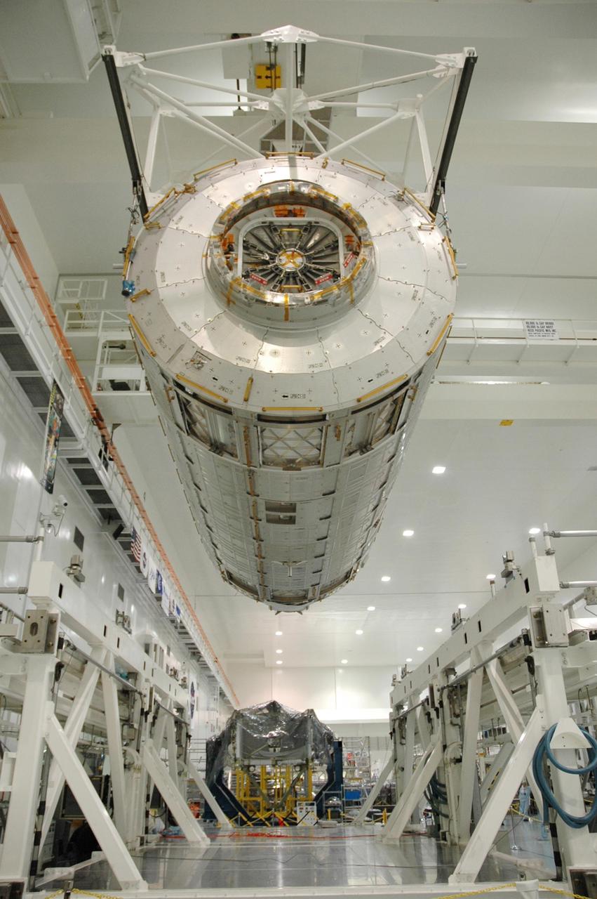 KENNEDY SPACE CENTER, FLA. --   In the Space Station Processing Facility, the Japanese Experiment Module (JEM), after being weighed, is lifted off the scale to be returned to its transporter. The Japanese Aerospace Exploration Agency developed the laboratory at the Tsukuba Space Center near Tokyo. It is the first element, named "Kibo" (Hope), to be delivered to KSC. The JEM is Japan's primary contribution to the International Space Station. It will enhance the unique research capabilities of the orbiting complex by providing an additional environment for astronauts to conduct science experiments. The JEM is targeted for mission STS-124, to launch in early 2008.  Photo credit: NASA/Troy Cryder
