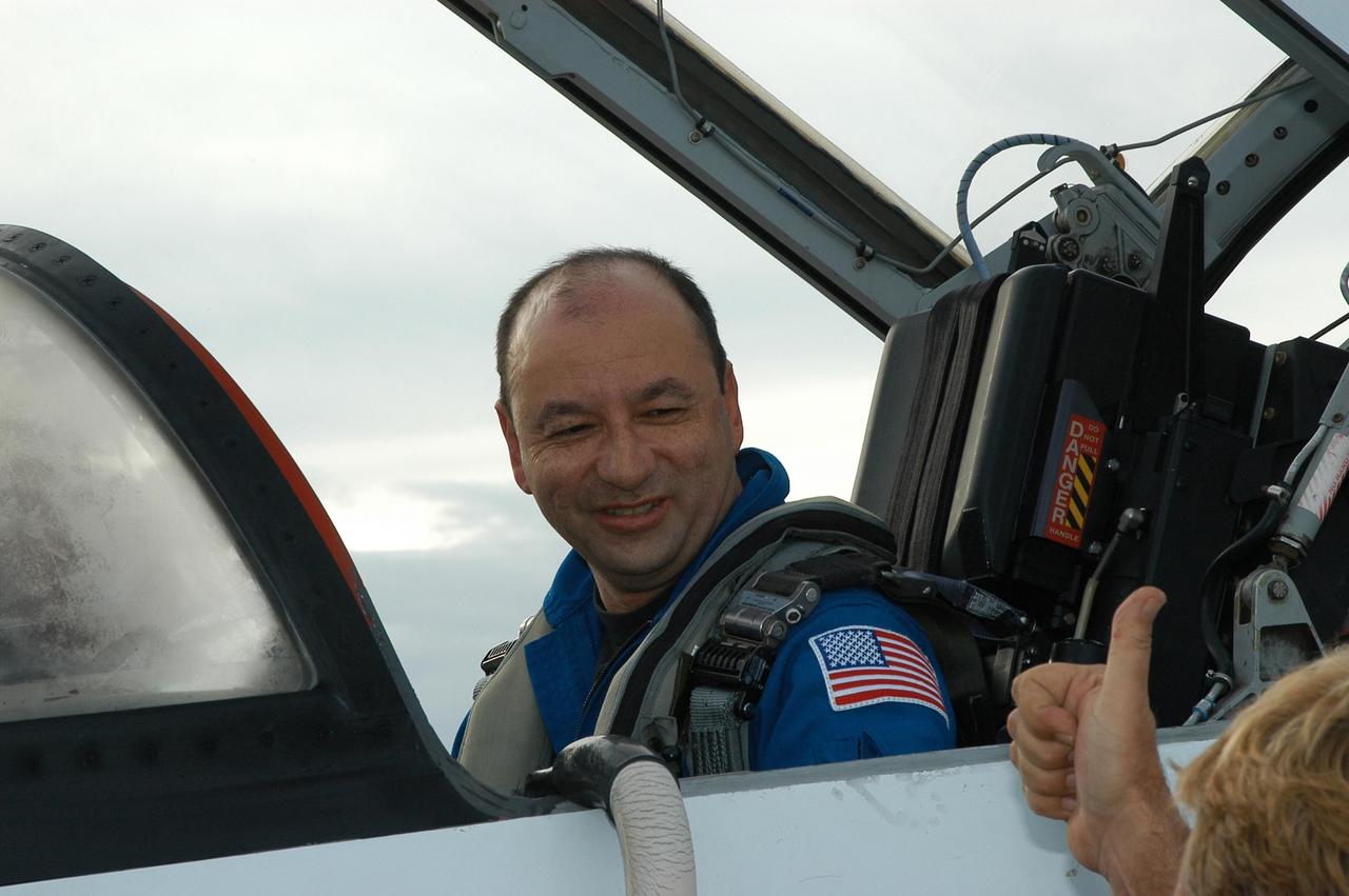 KENNEDY SPACE CENTER, FLA. -- STS-116 Commander Mark Polansky arrives at the Shuttle Landing Facility aboard a T-38 jet aircraft for the launch of Space Shuttle Discovery on Dec. 7. On the mission, he and other crew members will deliver truss segment, P5, to the International Space Station and begin the intricate process of reconfiguring and redistributing the power generated by two pairs of U.S. solar arrays. The P5 will be mated to the P4 truss that was delivered and attached during the STS-115 mission in September. Photo credit: NASA/Kim Shiflett