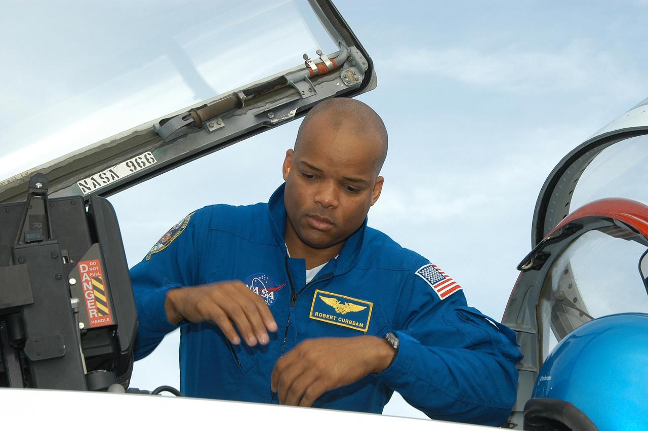 KENNEDY SPACE CENTER, FLA. -- STS-116 Mission Specialist Robert Curbeam arrives at the Shuttle Landing Facility aboard a T-38 jet aircraft for the launch of Space Shuttle Discovery on Dec. 7. On the mission, he and other crew members will deliver truss segment, P5, to the International Space Station and begin the intricate process of reconfiguring and redistributing the power generated by two pairs of U.S. solar arrays. The P5 will be mated to the P4 truss that was delivered and attached during the STS-115 mission in September. Photo credit: NASA/Kim Shiflett