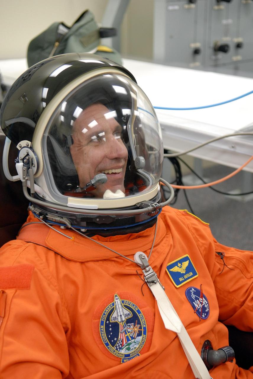 KENNEDY SPACE CENTER, FLA. -- The crew members of mission STS-116 are suiting up for launch at 9:35 p.m. EST from Launch Pad 39B aboard Space Shuttle Discovery. Pictured here is Pilot William Oefelein, who will be making his first shuttle flight. This is Discovery's 33rd mission and the first night launch since 2003. The 20th shuttle mission to the International Space Station, STS-116 carries another truss segment, P5. It will serve as a spacer, mated to the P4 truss that was attached in September. After installing the P5, the crew will reconfigure and redistribute the power generated by two pairs of U.S. solar arrays. Landing is expected Dec. 19 at KSC. Photo credit: NASA/Kim Shiflett
