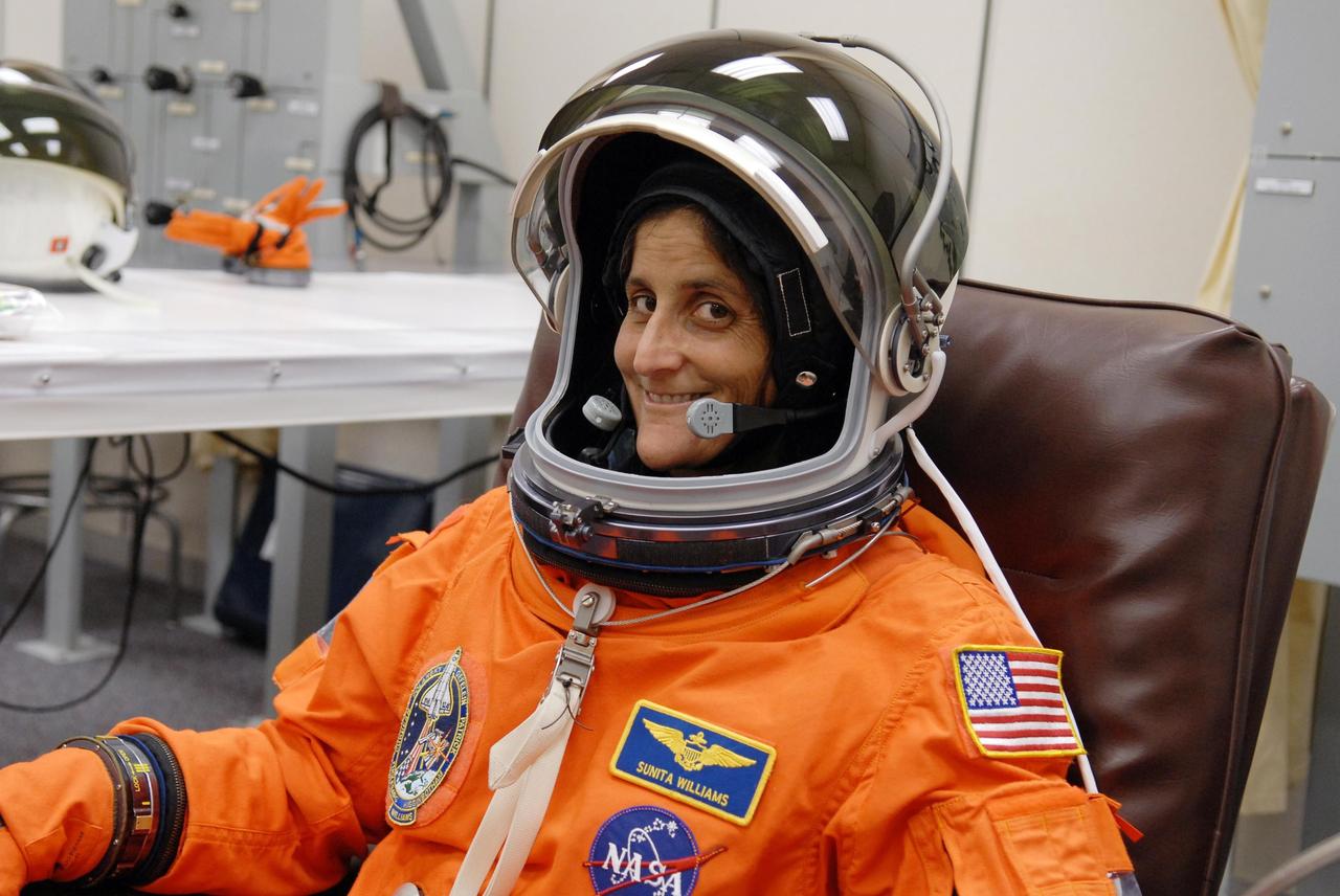KENNEDY SPACE CENTER, FLA. --   The crew members of mission STS-116 are suiting up for a second launch attempt at 8:47 p.m. EST from Launch Pad 39B aboard Space Shuttle Discovery.  Pictured here is Mission Specialist Sunita Williams, who will be making her first shuttle flight.  Williams will replace International Space Station Expedition 14 crew member Thomas Reiter, who will return to Earth aboard Discovery in her place.  The first launch attempt of STS-116 on Dec. 7 was postponed due a low cloud ceiling over Kennedy Space Center. This is Discovery's 33rd mission and the first night launch since 2002.   The 20th shuttle mission to the International Space Station, STS-116 carries another truss segment, P5. It will serve as a spacer, mated to the P4 truss that was attached in September.  After installing the P5, the crew will reconfigure and redistribute the power generated by two pairs of U.S. solar arrays. Landing is expected Dec. 19 at KSC.   Photo credit: NASA/Kim Shiflett