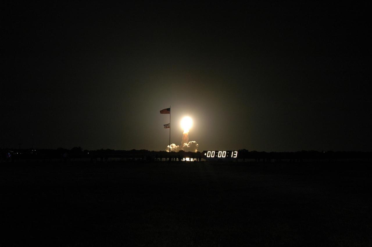 KENNEDY SPACE CENTER, FLA. --    Flooding the night sky with its blazing light, Space Shuttle Discovery leaps toward the sky from Launch Pad 39B on mission STS-116. The launch occurred at 8:47:35 p.m. EST. This was the second launch attempt for mission STS-116.  The first launch attempt on Dec. 7 was postponed due a low cloud ceiling over Kennedy Space Center. This is Discovery's 33rd mission and the first night launch since 2002.   The 20th shuttle mission to the International Space Station, STS-116 carries another truss segment, P5. It will serve as a spacer, mated to the P4 truss that was attached in September.  After installing the P5, the crew will reconfigure and redistribute the power generated by two pairs of U.S. solar arrays. Landing is expected Dec. 21 at KSC.   Photo credit: NASA/Jim Grossmann