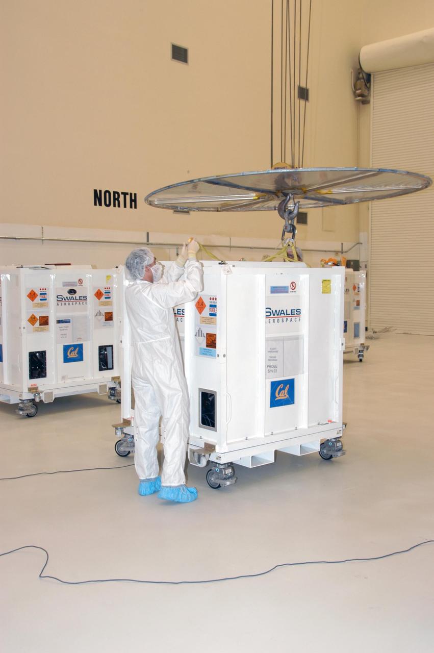 KENNEDY SPACE CENTER, FLA. -- At Astrotech Space Operations in Titusville, Fla., an overhead crane is in position to lift the crate from one of the components of the recently arrived THEMIS spacecraft. THEMIS, which stands for Time History of Events and Macroscale Interactions during Substorms, comprises five identical probes that will study the dynamic and colorful eruptions of auroras. THEMIS is scheduled to launch Feb. 15 from Cape Canaveral Air Force Station. Photo credit: NASA/George Shelton