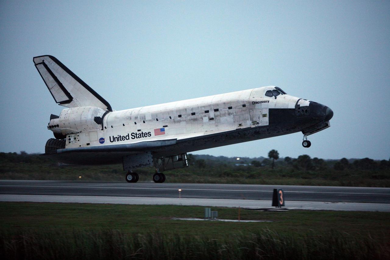 KENNEDY SPACE CENTER, FLA. -- On the shortest day of the year, Discovery touches down on Runway 15 at NASA Kennedy Space Center's Shuttle Landing Facility as the sun sets, concluding mission STS-116. Aboard are Commander Mark Polansky, Pilot William Oefelein, and Mission Specialists Robert Curbeam, Joan Higginbotham, Nicholas Patrick and Christer Fuglesang, who represents the European Space Agency, as well as Thomas Reiter, who is returning from a 6-month stay on the International Space Station. During the mission, three spacewalks attached the P5 integrated truss structure to the station, and completed the rewiring of the orbiting laboratory’s power system. A fourth spacewalk retracted a stubborn solar array. Main gear touchdown was at 5:32 p.m. EST. Nose gear touchdown was at 5:32:12 p.m. and wheel stop was at 5:32:52 p.m. At touchdown -- nominally about 2,500 ft. beyond the runway threshold -- the orbiter is traveling at a speed ranging from 213 to 226 mph. Discovery traveled 5,330,000 miles, landing on orbit 204. Mission elapsed time was 12 days, 20 hours, 44 minutes and 16 seconds. This is the 64th landing at KSC. Photo credit: NASA/Chris Lynch