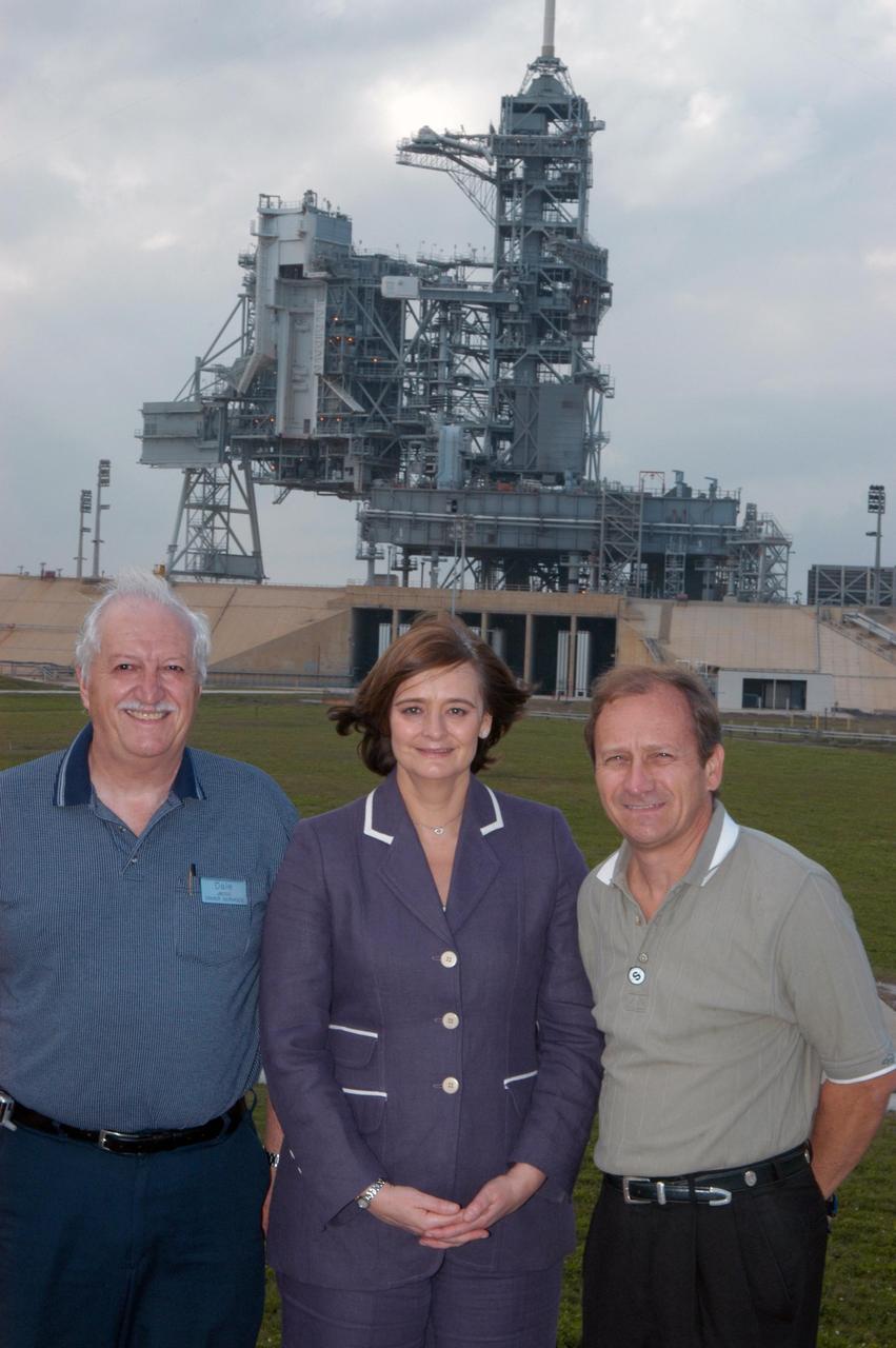 KENNEDY SPACE CENTER, FLA. --    Cherie Blair, wife of Tony Blair, prime minister of Great Britain, stops at Launch Pad 39B on a tour of Kennedy Space Center. At left is the KSC bus driver, Dale Meneau, and at right is Robert Dudiak, a personal friend of the Blairs. Mrs. Blair is an attorney (barrister) in England. She was Chancellor of Liverpool John Moores University from 1999-2006, and in July 2006 was awarded the honorary title of Emeritus Chancellor. She is also Governor of the London School of Economics and the Open University. She is a founding member of Matrix Chambers in London, from which she continues to practice as a barrister, which specializes in human rights law.  Photo credit: NASA/John Keckley
