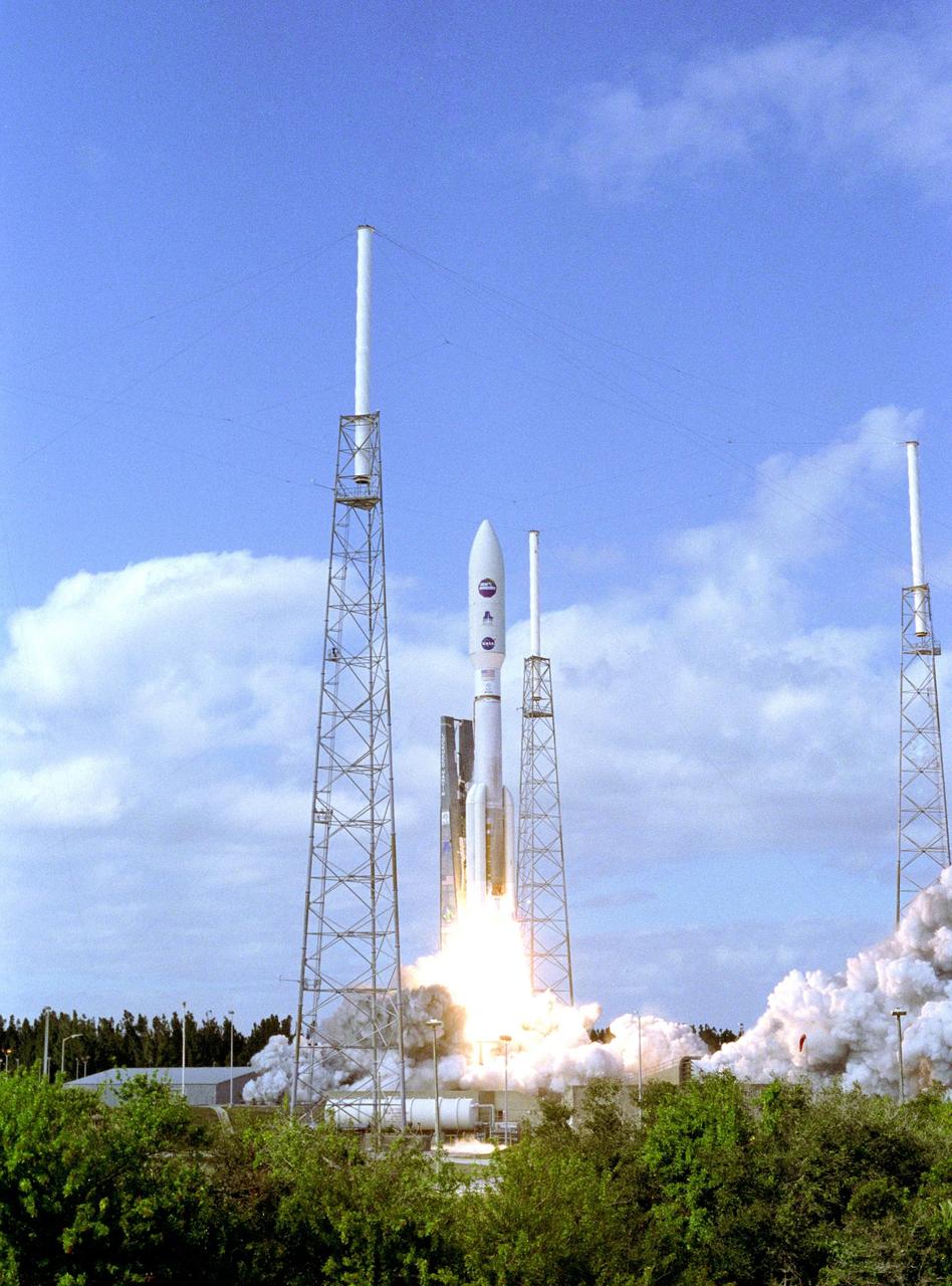 KENNEDY SPACE CENTER, FLA.  —   From between lightning masts surrounding the launch pad, NASA’s New Horizons spacecraft roars into the blue sky aboard an Atlas V rocket spewing flames and smoke.  Liftoff was on time at 2 p.m. EST from Complex 41 on Cape Canaveral Air Force Station in Florida.  This was the third launch attempt in as many days after scrubs due to weather concerns.   The compact, 1,050-pound piano-sized probe will get a boost from a kick-stage solid propellant motor for its journey to Pluto. New Horizons will be the fastest spacecraft ever launched, reaching lunar orbit distance in just nine hours and passing Jupiter 13 months later. The New Horizons science payload, developed under direction of Southwest Research Institute, includes imaging infrared and ultraviolet spectrometers, a multi-color camera, a long-range telescopic camera, two particle spectrometers, a space-dust detector and a radio science experiment. The dust counter was designed and built by students at the University of Colorado, Boulder. The launch at this time allows New Horizons to fly past Jupiter in early 2007 and use the planet’s gravity as a slingshot toward Pluto. The Jupiter flyby trims the trip to Pluto by as many as five years and provides opportunities to test the spacecraft’s instruments and flyby capabilities on the Jupiter system. New Horizons could reach the Pluto system as early as mid-2015, conducting a five-month-long study possible only from the close-up vantage of a spacecraft.