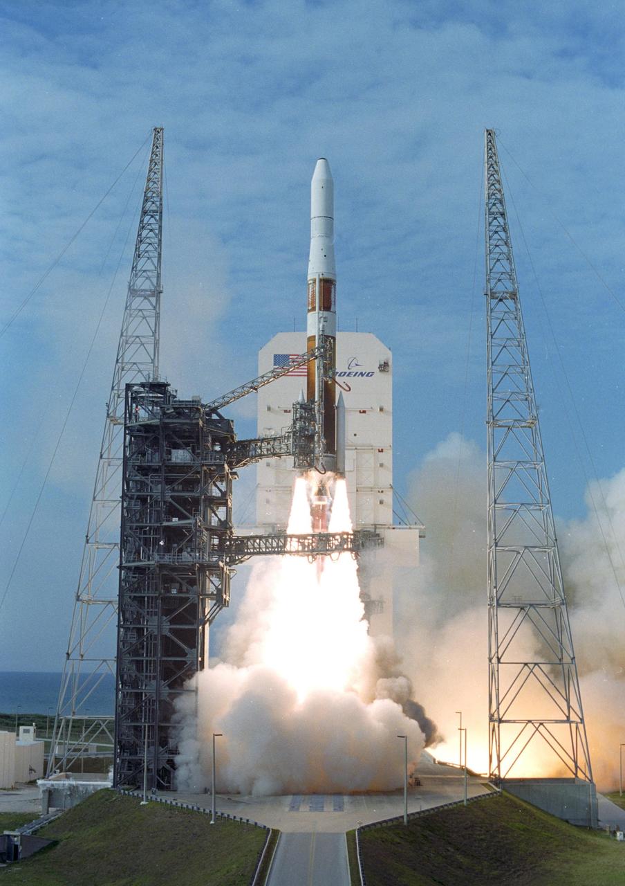 KENNEDY SPACE CENTER, FLA. - Flames and smoke billow out from under the Boeing Delta IV rocket at liftoff, carrying the GOES-N satellite. Liftoff from Launch Complex 37 at Cape Canaveral Air Force Station was on time at 6:11 p.m. EDT. GOES-N is the latest in the Earth-monitoring series of Geostationary Operational Environmental Satellites developed by NASA and the National Oceanic and Atmospheric Administration. By maintaining a stationary orbit, hovering over one position on the Earth's surface, GOES will be able to provide a constant vigil for the atmospheric "triggers" for severe weather conditions such as tornadoes, flash floods, hail storms and hurricanes. Photo credit: NASA/Tim Terry
