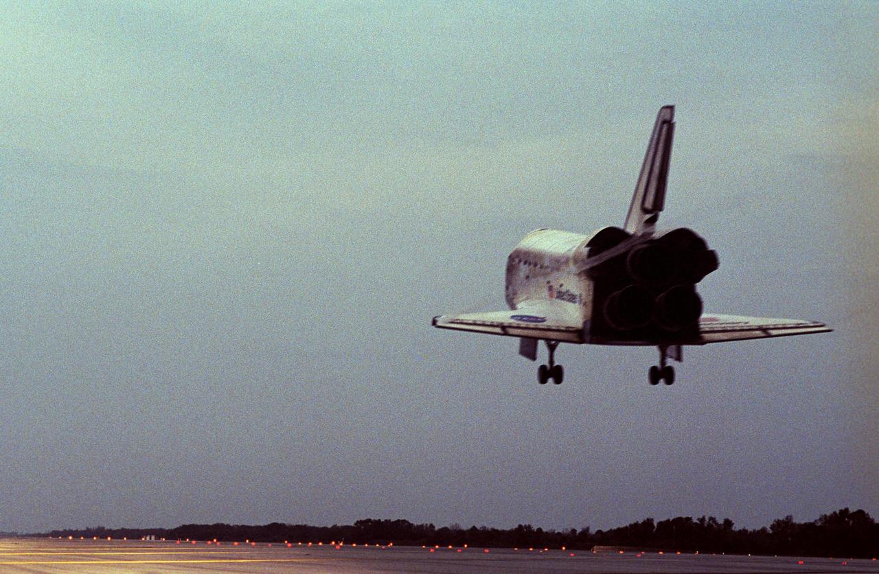 KENNEDY SPACE CENTER, FLA. -- Near sunset, Space Shuttle Discovery approaches an illuminated Runway 15 at NASA Kennedy Space Center's Shuttle Landing Facility on the shortest day of the year, concluding mission STS-116. Main gear touchdown was at 5:32 p.m. EST. Nose gear touchdown was at 5:32:12 p.m. and wheel stop was at 5:32:52 p.m. At touchdown -- nominally about 2,500 ft. beyond the runway threshold -- the orbiter is traveling at a speed ranging from 213 to 226 mph. Discovery traveled 5,330,000 miles, landing on orbit 204. Mission elapsed time was 12 days, 20 hours, 44 minutes and 16 seconds. This is the 64th landing at KSC. Aboard Discovery are Commander Mark Polansky, Pilot William Oefelein, and Mission Specialists Robert Curbeam, Joan Higginbotham, Nicholas Patrick and Christer Fuglesang, who represents the European Space Agency, as well as Thomas Reiter, who is returning from a 6-month stay on the International Space Station. During the mission, three spacewalks attached the P5 integrated truss structure to the station, and completed the rewiring of the orbiting laboratory’s power system. A fourth spacewalk retracted a stubborn solar array.