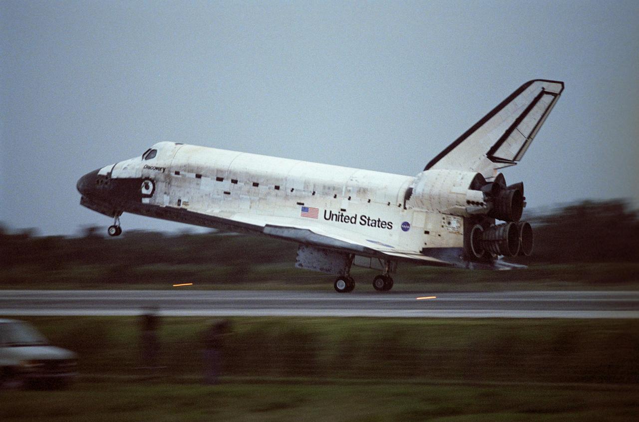 KENNEDY SPACE CENTER, FLA. -- Space Shuttle Discovery touches down on Runway 15 at NASA Kennedy Space Center's Shuttle Landing Facility on the shortest day of the year, concluding mission STS-116. Main gear touchdown was at 5:32 p.m. EST. Nose gear touchdown was at 5:32:12 p.m. and wheel stop was at 5:32:52 p.m. At touchdown -- nominally about 2,500 ft. beyond the runway threshold -- the orbiter is traveling at a speed ranging from 213 to 226 mph. Discovery traveled 5,330,000 miles, landing on orbit 204. Mission elapsed time was 12 days, 20 hours, 44 minutes and 16 seconds. This is the 64th landing at KSC. Aboard Discovery are Commander Mark Polansky, Pilot William Oefelein, and Mission Specialists Robert Curbeam, Joan Higginbotham, Nicholas Patrick and Christer Fuglesang, who represents the European Space Agency, as well as Thomas Reiter, who is returning from a 6-month stay on the International Space Station. During the mission, three spacewalks attached the P5 integrated truss structure to the station, and completed the rewiring of the orbiting laboratory’s power system. A fourth spacewalk retracted a stubborn solar array.
