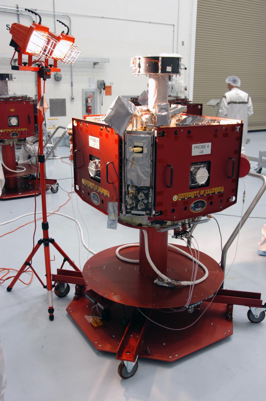 In the Hazardous Processing Facility at Astrotech Space Operations, one of the THEMIS probes undergoes solar array illumination telemetry testing. THEMIS consists of five identical probes, the largest number of scientific satellites ever launched into orbit aboard a single rocket. This unique constellation of satellites will resolve the tantalizing mystery of what causes the spectacular sudden brightening of the aurora borealis and aurora australis - the fiery skies over the Earth's northern and southern polar regions. THEMIS is scheduled to launch aboard the Delta II at 6:07 p.m. EST on Feb. 15.