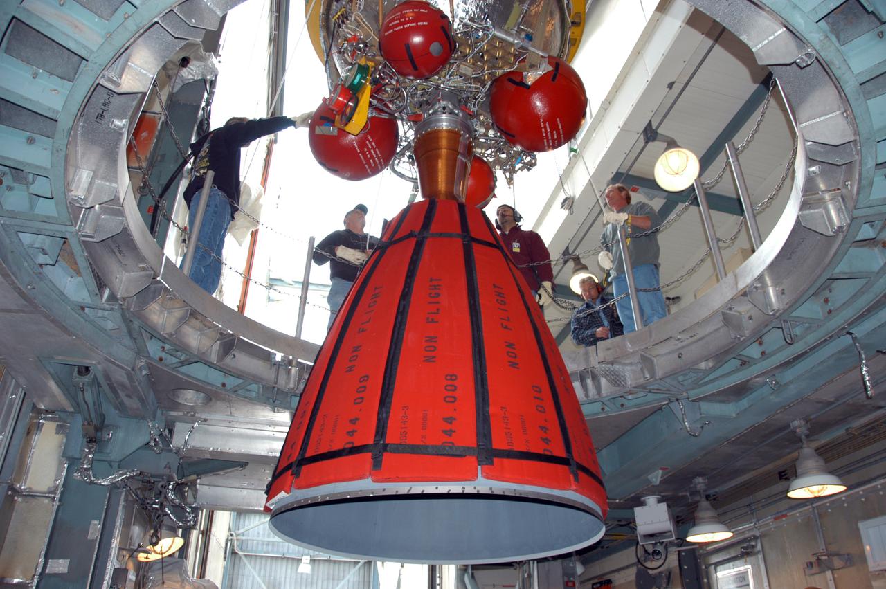 On Pad 17-B at Cape Canaveral Air Force Station, the Delta II second stage is being lowered toward the Delta II first stage, already in place inside the mobile service tower. The Delta II is the launch vehicle for the THEMIS spacecraft. THEMIS consists of five identical probes, the largest number of scientific satellites ever launched into orbit aboard a single rocket. This unique constellation of satellites will resolve the tantalizing mystery of what causes the spectacular sudden brightening of the aurora borealis and aurora australis - the fiery skies over the Earth's northern and southern polar regions. THEMIS is scheduled to launch Feb. 15 from Cape Canaveral Air Force Station.