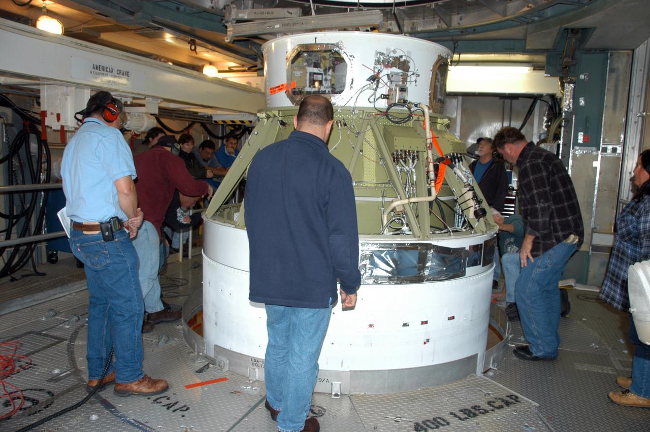 Inside the mobile service tower on Pad 17-B at Cape Canaveral Air Force Station, the Delta II second stage is mated with the first stage. The Delta II is the launch vehicle for the THEMIS spacecraft. THEMIS consists of five identical probes, the largest number of scientific satellites ever launched into orbit aboard a single rocket. This unique constellation of satellites will resolve the tantalizing mystery of what causes the spectacular sudden brightening of the aurora borealis and aurora australis - the fiery skies over the Earth's northern and southern polar regions. THEMIS is scheduled to launch Feb. 15 from Cape Canaveral Air Force Station.