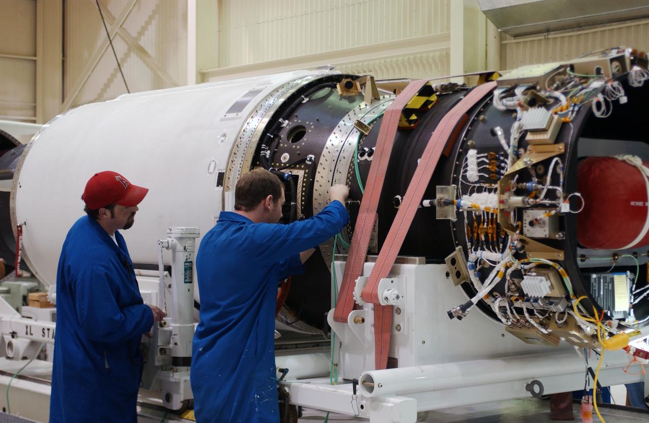 At Vandenberg Air Force Base in California, the three stages of the Orbital Sciences Pegasus XL are being mated for the launch of NASA's Aeronomy of Ice in the Mesosphere, or AIM, spacecraft. AIM is the seventh Small Explorers mission under NASA's Explorer Program. The program provides frequent flight opportunities for world-class scientific investigations from space within heliophysics and astrophysics. The AIM spacecraft will fly three instruments designed to study polar mesospheric clouds located at the edge of space, 50 miles above the Earth's surface in the coldest part of the planet's atmosphere. The mission's primary goal is to explain why these clouds form and what has caused them to become brighter and more numerous and appear at lower latitudes in recent years. AIM's results will provide the basis for the study of long-term variability in the mesospheric climate and its relationship to global climate change. AIM is scheduled to be mated to the Pegasus XL during the second week of April, after which final inspections will be conducted. Launch is scheduled for April 25.