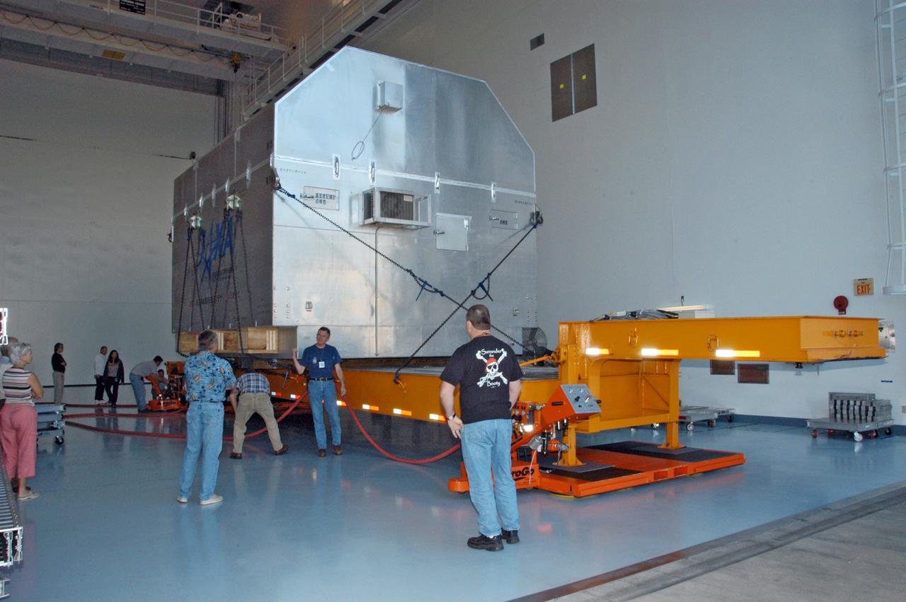 The Experiment Logistics Module Pressurized Section for the Japanese Experiment Module arrives at the Space Station Processing Facility for uncrating. The logistics module is one of the components of the Japanese Experiment Module or JEM, also known as Kibo, which means "hope" in Japanese. Kibo comprises six components: two research facilities -- the Pressurized Module and Exposed Facility; a Logistics Module attached to each of them; a Remote Manipulator System; and an Inter-Orbit Communication System unit. Kibo also has a scientific airlock through which experiments are transferred and exposed to the external environment of space. Kibo is Japan's first human space facility and its primary contribution to the station. Kibo will enhance the unique research capabilities of the orbiting complex by providing an additional environment in which astronauts can conduct science experiments. The various components of JEM will be assembled in space over the course of three Space Shuttle missions. The first of those three missions, STS-123, will carry the Experiment Logistics Module Pressurized Section aboard the Space Shuttle Endeavour, targeted for launch in 2007.