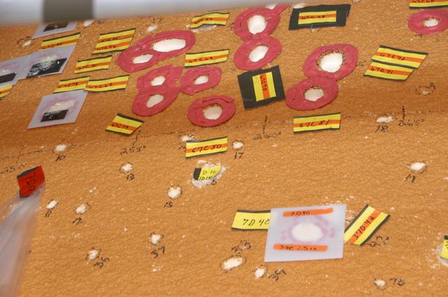 Space Shuttle Atlantis' external tank repairs from Hail Damage