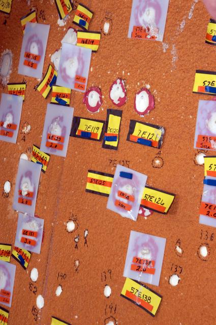 NASA image: Hail damage on Atlantis' external tank is inspected