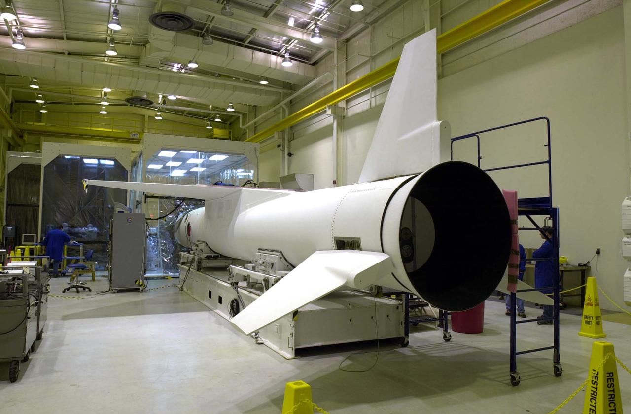 At Vandenberg Air Force Base in California, the Orbital Sciences Pegasus XL rocket is ready for mating to the AIM spacecraft. AIM, which stands for Aeronomy of Ice in the Mesosphere, is being prepared for integrated testing and a flight simulation. The AIM spacecraft will fly three instruments designed to study polar mesospheric clouds located at the edge of space, 50 miles above the Earth's surface in the coldest part of the planet's atmosphere. The mission's primary goal is to explain why these clouds form and what has caused them to become brighter and more numerous and appear at lower latitudes in recent years. AIM's results will provide the basis for the study of long-term variability in the mesospheric climate and its relationship to global climate change. Launch from the Pegasus XL rocket is scheduled for April 25.