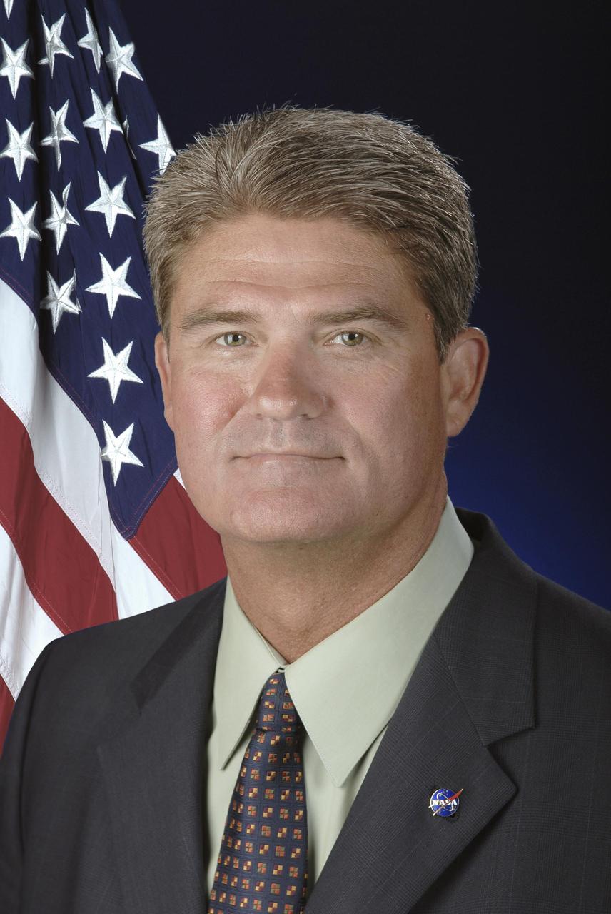 Official portrait of William W. "Bill" Parsons, director of the John F. Kennedy Space Center.