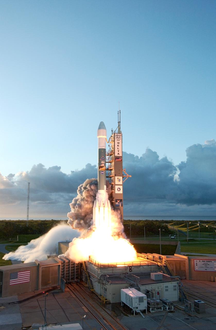 Against a backdrop of clouds on the horizon, the Delta II rocket carrying NASA's Dawn spacecraft rises from the smoke and fire on the launch pad to begin its 1.7-billion-mile journey through the inner solar system to study a pair of asteroids. Liftoff was at 7:34 a.m. EDT from Pad 17-B at Cape Canaveral Air Force Station. Dawn is the ninth mission in NASA's Discovery Program. The spacecraft will be the first to orbit two planetary bodies, asteroid Vesta and dwarf planet Ceres, during a single mission. Vesta and Ceres lie in the asteroid belt between Mars and Jupiter. It is also NASA's first purely scientific mission powered by three solar electric ion propulsion engines.