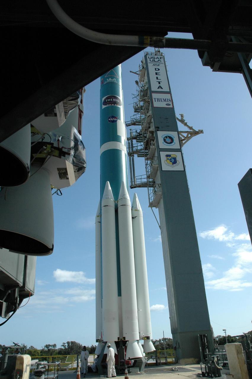 KENNEDY SPACE CENTER, FLA. --   Solid rocket boosters are clustered around the base of the United Launch Alliance Delta II rocket.  A total of nine will assist in the launch of the THEMIS integrated spacecraft. THEMIS consists of five identical probes, the largest number of scientific satellites ever launched into orbit aboard a single rocket. This unique constellation of satellites will resolve the tantalizing mystery of what causes the spectacular sudden brightening of the aurora borealis and aurora australis - the fiery skies over the Earth's northern and southern polar regions. THEMIS is scheduled to launch Feb. 15 from Cape Canaveral Air Force Station.  Photo credit: NASA/Jack Pfaller