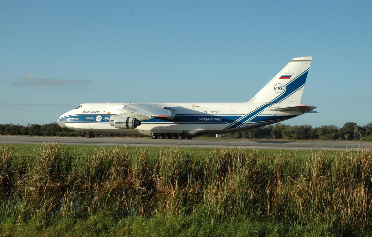 KENNEDY SPACE CENTER, FLA. -- At the KSC Shuttle Landing Facility, the Antonov 124 aircraft arrives with its cargo, the remote manipulator system for the Japanese Experiment Module. The JEM, named "Kibo" (Hope), is Japan's primary contribution to the International Space Station. It will enhance the unique research capabilities of the orbiting complex by providing an additional environment for astronauts to conduct science experiments. The Japanese Aerospace Exploration Agency developed the laboratory. Both the JEM and RMS are targeted for mission STS-124, to launch in early 2008. Photo credit: NASA/Jack Pfaller
