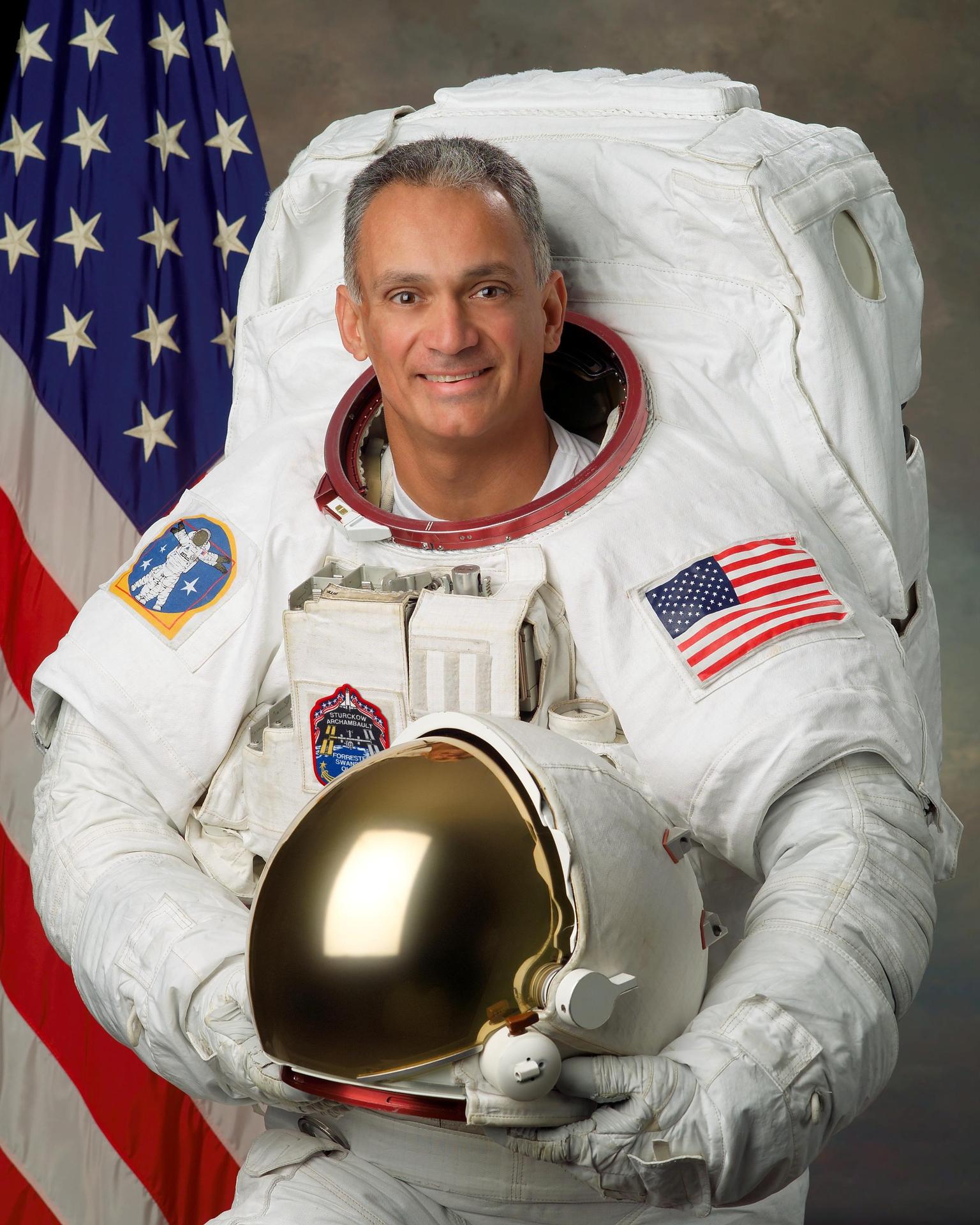 Official astronaut portrait for John Olivas