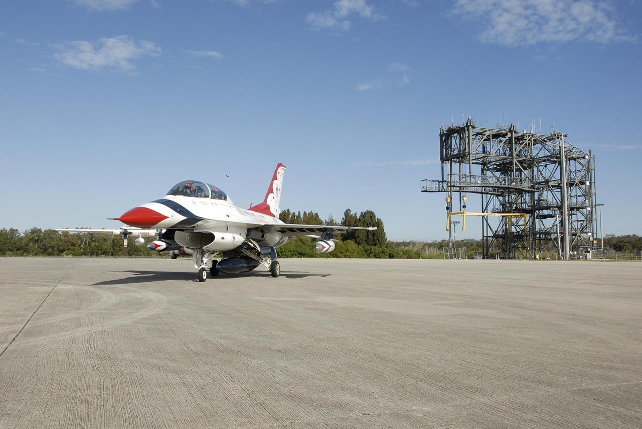 KENNEDY SPACE CENTER, FLA. --  A U.S. Air Force Thunderbird F-16D aircraft rolls to a stop at the Kennedy Space Center Shuttle Landing Facility.  The pilot is Maj. Tad Clark, who announced to waiting media that Kennedy Space Center Visitor Complex will host the inaugural World Space Expo from Nov. 3 to 11. The Expo, which will feature an aerial salute by the Thunderbirds on its opening weekend, will create one of the largest displays of space artifacts, hardware and personalities ever assembled in one location with the objective to inspire, educate and engage the public by highlighting the achievements and benefits of space exploration.  Photo credit: NASA/Kim Shiflett