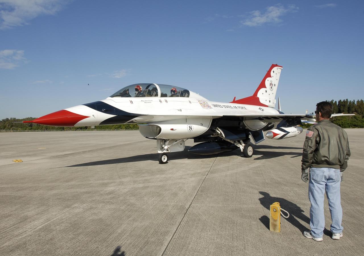 KENNEDY SPACE CENTER, FLA. --  A U.S. Air Force Thunderbird F-16D aircraft comes to a stop at the Kennedy Space Center Shuttle Landing Facility.  The pilot is Maj. Tad Clark, who announced to waiting media that Kennedy Space Center Visitor Complex will host the inaugural World Space Expo from Nov. 3 to 11. The Expo, which will feature an aerial salute by the Thunderbirds on its opening weekend, will create one of the largest displays of space artifacts, hardware and personalities ever assembled in one location with the objective to inspire, educate and engage the public by highlighting the achievements and benefits of space exploration.  Photo credit: NASA/Kim Shiflett