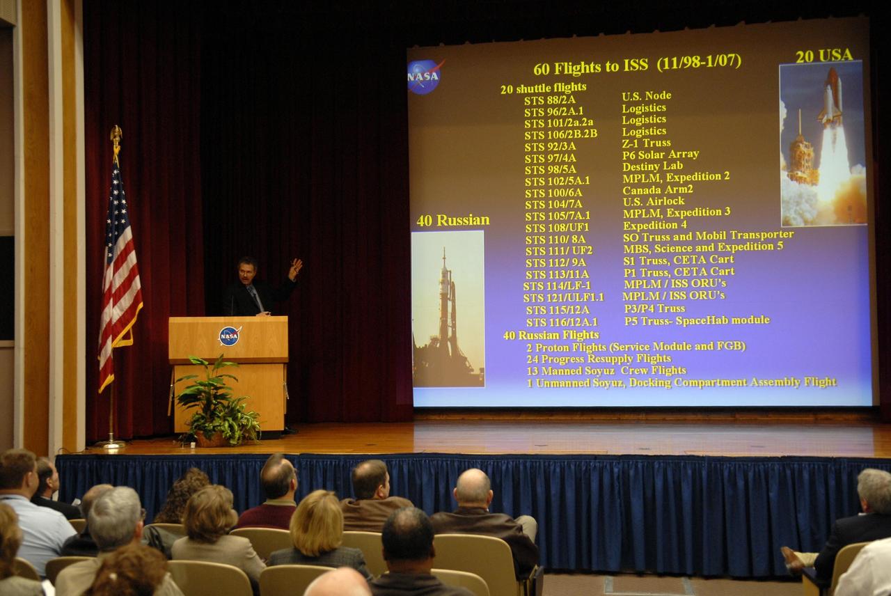 KENNEDY SPACE CENTER, FLA. --  During an all-hands meeting, Russ Romanella, director of the ISS & Spacecraft Processing Directorate, talks to employees about the shuttle flights to the space station already accomplished and those to come in the years ahead.  Photo credit: NASA/Kim Shiflett