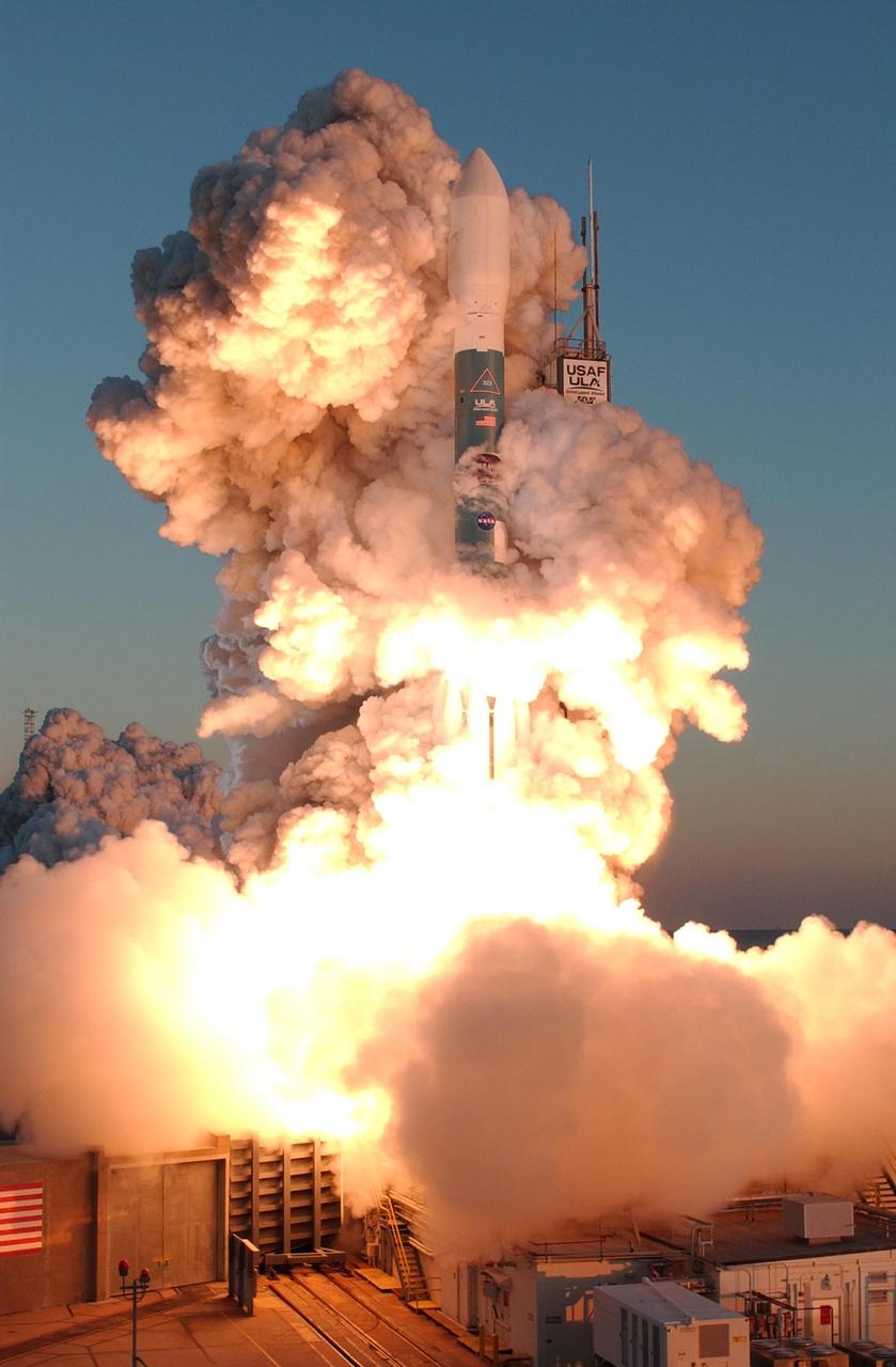 KENNEDY SPACE CENTER, FLA. -- At Cape Canaveral Air Force Station, clouds of smoke envelop the Delta II rocket with NASA's THEMIS spacecraft aboard as it blasts off Pad 17-B at 6:01 p.m. EST. THEMIS, an acronym for Time History of Events and Macroscale Interactions during Substorms, consists of five identical probes that will track violent, colorful eruptions near the North Pole.  This will be the largest number of scientific satellites NASA has ever launched into orbit aboard a single rocket.  The THEMIS mission aims to unravel the mystery behind auroral substorms, an avalanche of magnetic energy powered by the solar wind that intensifies the northern and southern lights.  The mission will investigate what causes auroras in the Earth’s atmosphere to dramatically change from slowly shimmering waves of light to wildly shifting streaks of bright color. Photo credit: NASA/Jerry Cannon