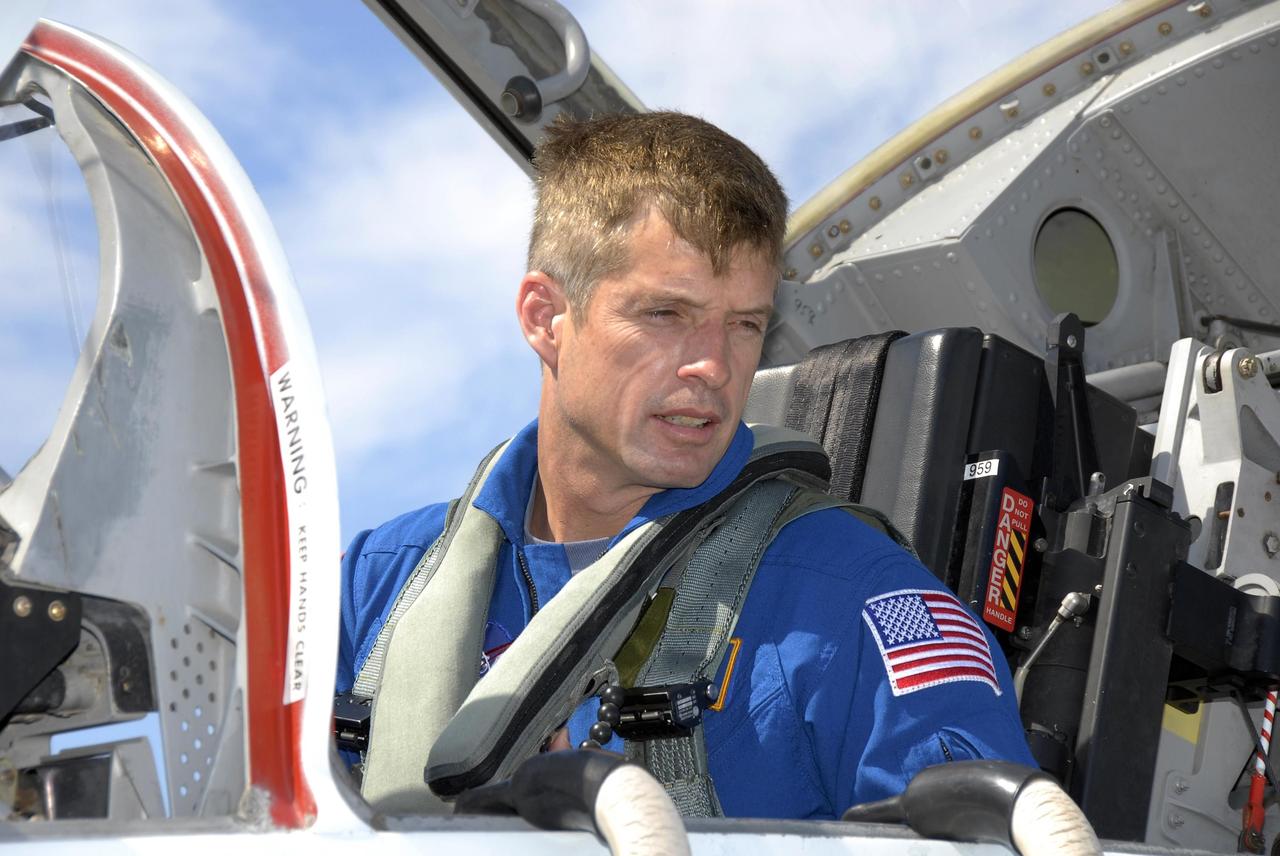 KENNEDY SPACE CENTER, FLA. -- The STS-117 crew arrives at NASA's Kennedy Space Center to take part in the Terminal Countdown Demonstration Test (TCDT), a preparation for the launch March 15 to the International Space Station. Seen here is Mission Specialist Steven Swanson in a T-38 jet aircraft. The TCDT includes emergency egress training and a simulated launch countdown. The mission payload aboard Space Shuttle Atlantis is the S3/S4 integrated truss structure, along with a third set of solar arrays and batteries. The crew of six astronauts will install the truss to continue assembly of the station. Photo credit: NASA/Kim Shiflett