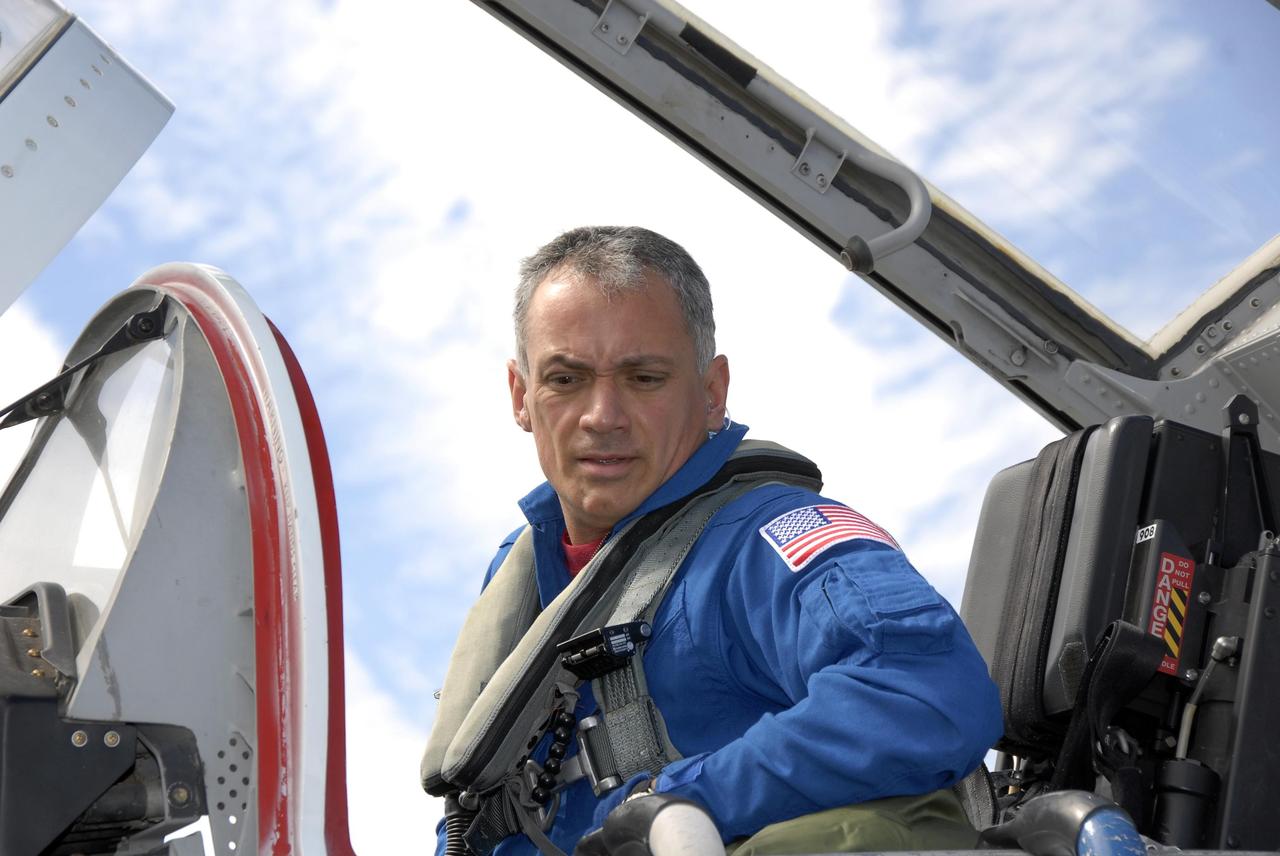 KENNEDY SPACE CENTER, FLA. -- The STS-117 crew arrives at NASA's Kennedy Space Center to take part in the Terminal Countdown Demonstration Test (TCDT), a preparation for the launch March 15 to the International Space Station. Seen here is Mission Specialist Danny Olivas in a T-38 jet aircraft. The TCDT includes emergency egress training and a simulated launch countdown.The mission payload aboard Space Shuttle Atlantis is the S3/S4 integrated truss structure, along with a third set of solar arrays and batteries. The crew of six astronauts will install the truss to continue assembly of the station. Photo credit: NASA/Kim Shiflett