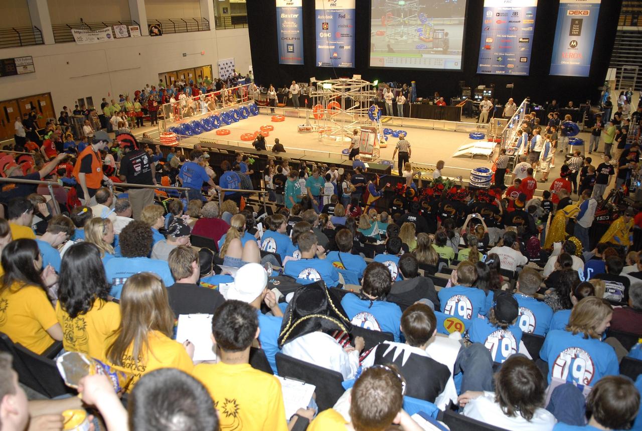 KENNEDY SPACE CENTER, FLA. --  The audience anxiously awaits a referee's decision during competition of student teams in the FIRST robotics event held at the University of Central Florida Arena March 8-10. The FIRST, or For Inspiration and Recognition of Science and Technology, Robotics Competition challenges teams of young people and their mentors to solve a common problem in a six-week timeframe using a standard "kit of parts" and a common set of rules. Teams build robots from the parts and enter them in a series of competitions designed by FIRST founder Dean Kamen and Dr. Woodie Flowers, chairman and vice chairman of the Executive Advisory Board respectively, and a committee of engineers and other professionals. FIRST redefines winning for these students. Teams are rewarded for excellence in design, demonstrated team spirit, gracious professionalism and maturity, and ability to overcome obstacles. Scoring the most points is a secondary goal. Winning means building partnerships that last. Photo credit: NASA/Kim Shiflett