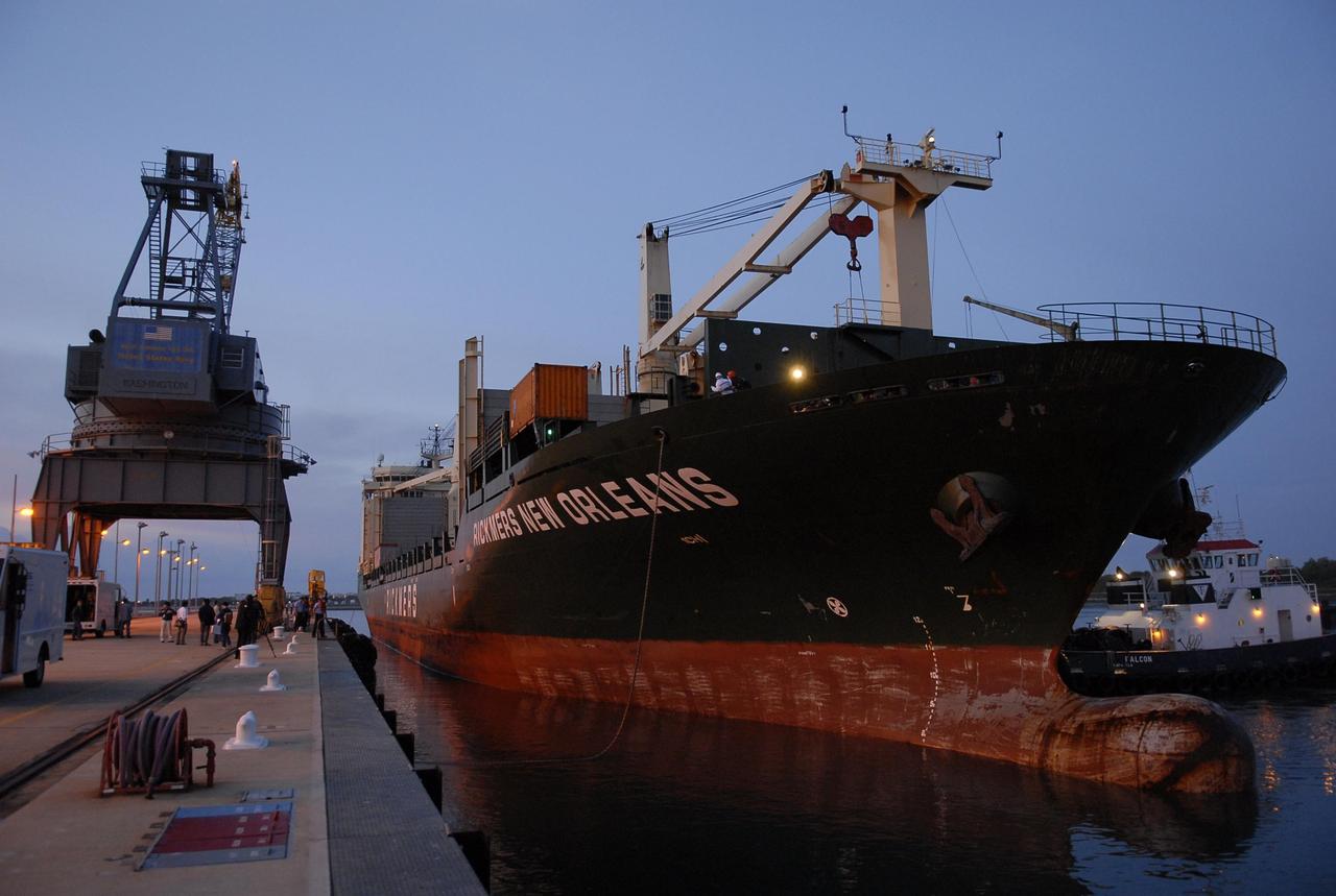 KENNEDY SPACE CENTER, FLA. -- The ship carrying the Experiment Logistics Module Pressurized Section for the Japanese Experiment Module arrives at the Trident wharf after departing from Yokohama, Japan, Feb. 7. The logistics module will be offloaded and transported to the Space Station Processing Facility at NASA's Kennedy Space Center. The Japanese Experiment Module is composed of three segments and is known as Kibo, which means "hope" in Japanese. Kibo consists of six components: two research facilities -- the Pressurized Module and Exposed Facility; a Logistics Module attached to each of them; a Remote Manipulator System; and an Inter-Orbit Communication System unit. Kibo also has a scientific airlock through which experiments are transferred and exposed to the external environment of space. Kibo is Japan's first human space facility and its primary contribution to the station. Kibo will enhance the unique research capabilities of the orbiting complex by providing an additional environment in which astronauts can conduct science experiments. The various components of JEM will be assembled in space over the course of three Space Shuttle missions. The first of those three missions, STS-123, will carry the Experiment Logistics Module Pressurized Section aboard the Space Shuttle Endeavour, targeted for launch in 2007. Photo credit: NASA/Kim Shiflett