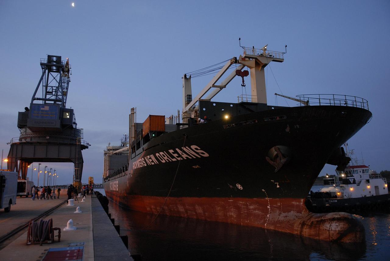 KENNEDY SPACE CENTER, FLA. -- The ship carrying the Experiment Logistics Module Pressurized Section for the Japanese Experiment Module arrives at the Trident wharf after departing from Yokohama, Japan, Feb. 7. The logistics module will be offloaded and transported to the Space Station Processing Facility at NASA's Kennedy Space Center. The Japanese Experiment Module is composed of three segments and is known as Kibo, which means "hope" in Japanese. Kibo consists of six components: two research facilities -- the Pressurized Module and Exposed Facility; a Logistics Module attached to each of them; a Remote Manipulator System; and an Inter-Orbit Communication System unit. Kibo also has a scientific airlock through which experiments are transferred and exposed to the external environment of space. Kibo is Japan's first human space facility and its primary contribution to the station. Kibo will enhance the unique research capabilities of the orbiting complex by providing an additional environment in which astronauts can conduct science experiments. The various components of JEM will be assembled in space over the course of three Space Shuttle missions. The first of those three missions, STS-123, will carry the Experiment Logistics Module Pressurized Section aboard the Space Shuttle Endeavour, targeted for launch in 2007. Photo credit: NASA/Kim Shiflett