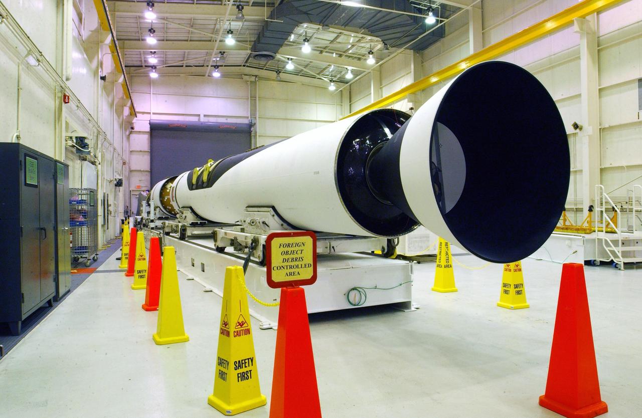 VANDENBERG AIR FORCE BASE, CALIF.  --  At Vandenberg Air Force Base in California, the second and third stages of the Orbital Sciences Pegasus XL rocket wait for mating.  The rocket is the launch vehicle for the NASA's Aeronomy of Ice in the Mesosphere, or AIM, spacecraft.  AIM is the seventh Small Explorers mission under NASA's Explorer Program. The program provides frequent flight opportunities for world-class scientific investigations from space within heliophysics and astrophysics. The AIM spacecraft will fly three instruments designed to study polar mesospheric clouds located at the edge of space, 50 miles above the Earth's surface in the coldest part of the planet's atmosphere. The mission's primary goal is to explain why these clouds form and what has caused them to become brighter and more numerous and appear at lower latitudes in recent years. AIM's results will provide the basis for the study of long-term variability in the mesospheric climate and its relationship to global climate change.  AIM is scheduled to be mated to the Pegasus XL during the second week of April, after which final inspections will be conducted.  Launch is scheduled for April 25.