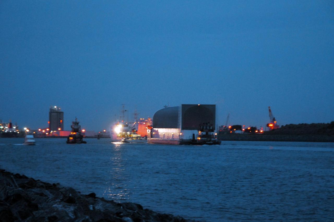 KENNEDY SPACE CENTER, FLA. -- The Pegasus barge arrives at Port Canaveral in Florida with its cargo of the external tank prepared for mission STS-118. The barge will be towed up the Banana River to the turn basin near the Vehicle Assembly Building where the tank will be offloaded and moved to the VAB. Photo credit: Jack Pfaller