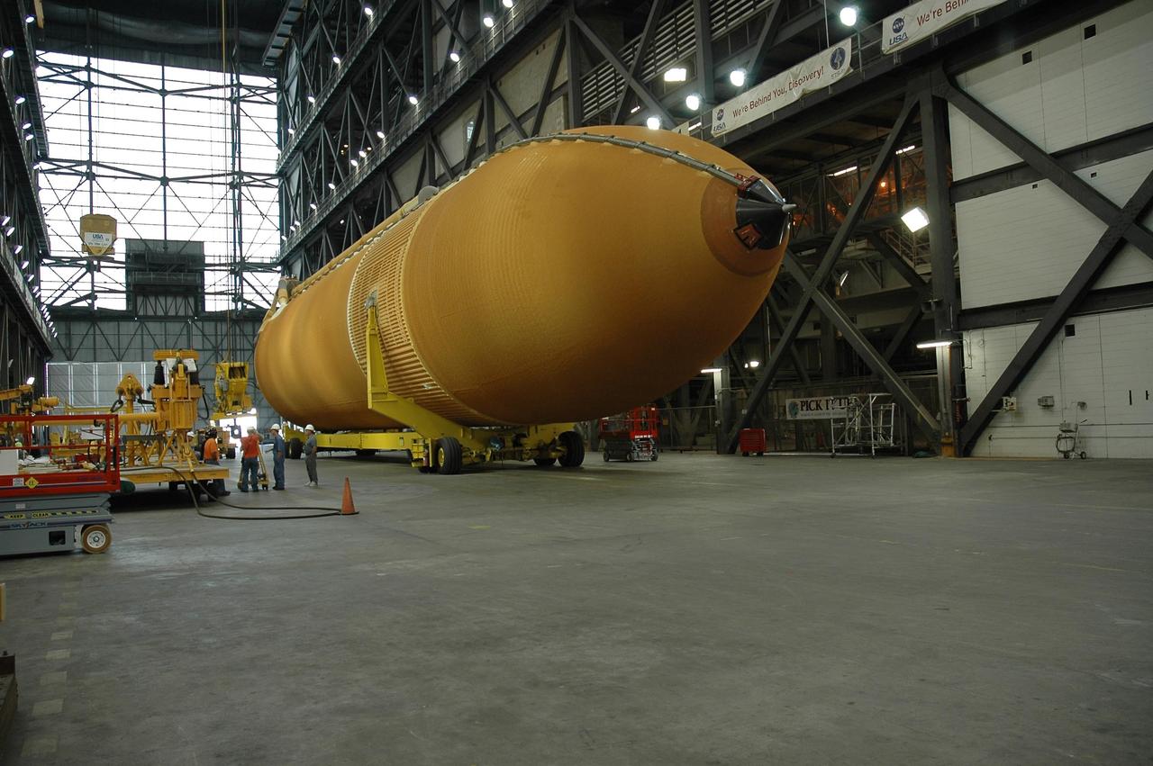 KENNEDY SPACE CENTER, FLA. -- In the Vehicle Assembly Building, external tank No. 117 is waiting to be raised off its transporter in order to lift it to a vertical position. Once vertical, the tank will be lifted into the checkout cell in high bay 2 for processing. ET-117 arrived aboard the Pegasus barge after its voyage around the Florida Peninsula from the Michoud Assembly Facility near New Orleans. The tank is slated for mission STS-118, which is targeted for launch in early August. Photo credit: NASA/Jack Pfaller