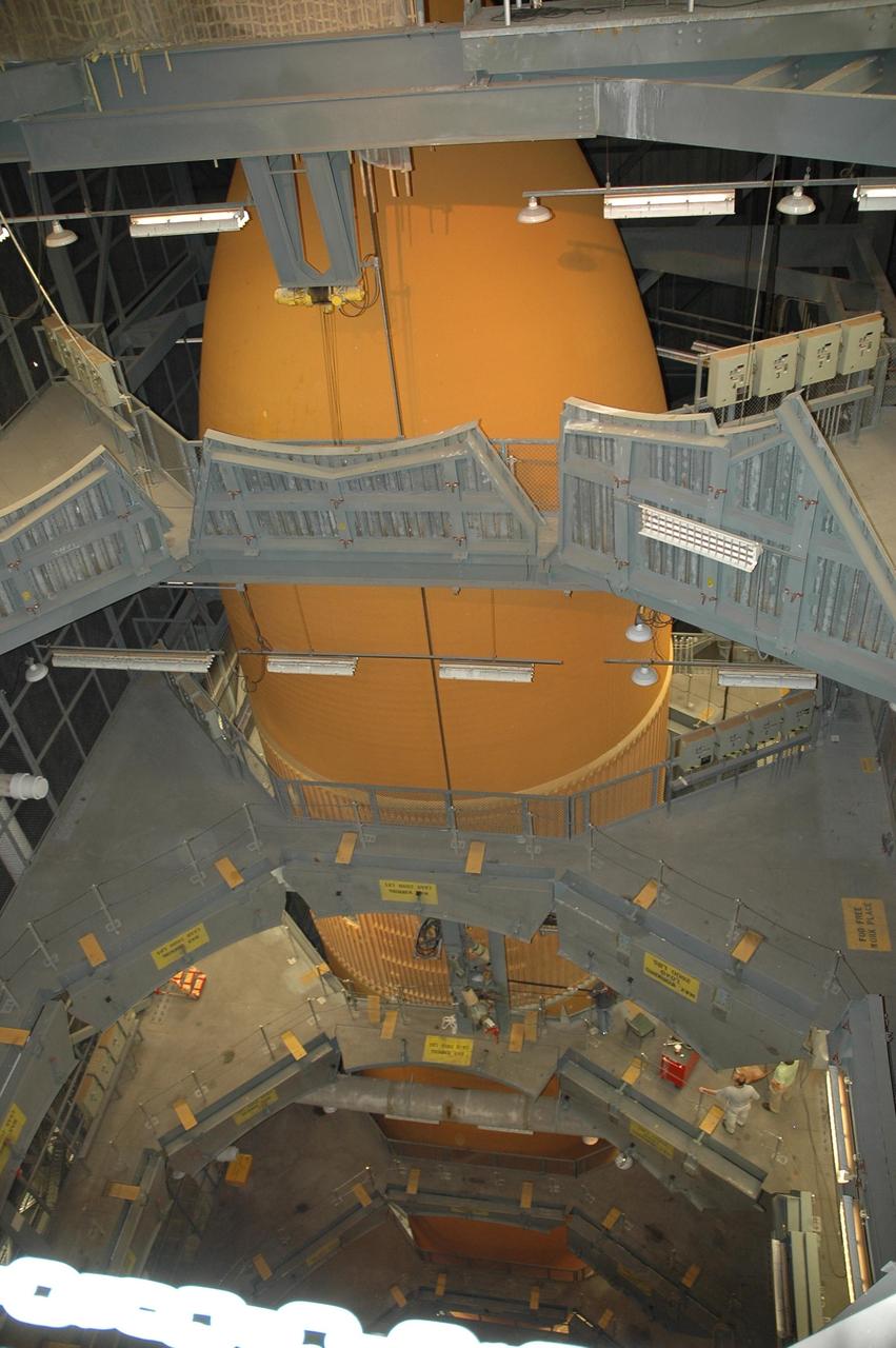 KENNEDY SPACE CENTER, FLA. -- In the Vehicle Assembly Building, the suspended external tank No. 117 has been lowered into the checkout cell in high bay 2 for processing. ET-117 arrived aboard the Pegasus barge after its voyage around the Florida Peninsula from the Michoud Assembly Facility near New Orleans. The tank is slated for mission STS-118, which is targeted for launch in early August. Photo credit: NASA/Jack Pfaller