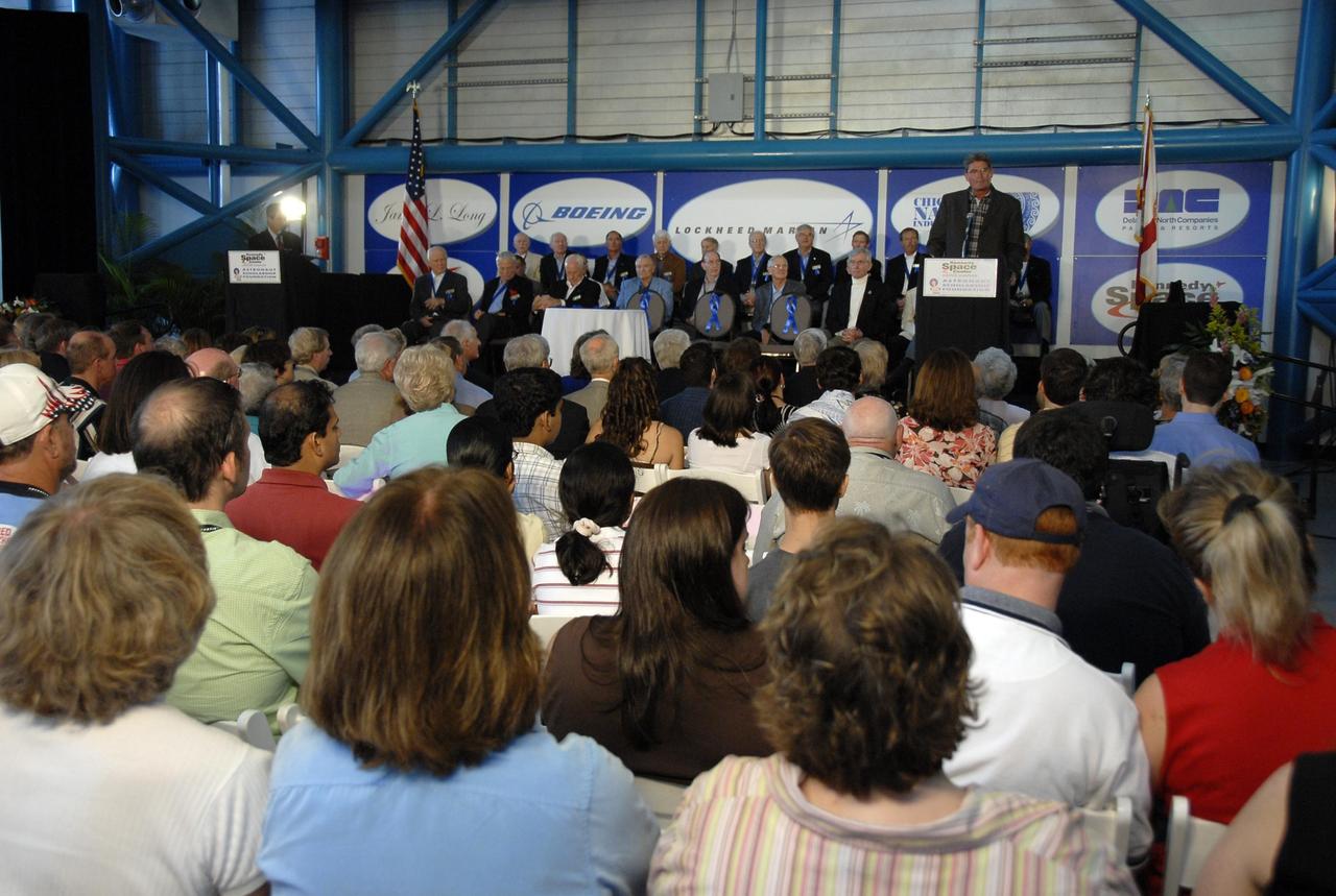 KENNEDY SPACE CENTER, FLA. --   At the U.S. Astronaut Hall of Fame induction ceremony, Kennedy Space Center Director Bill Parsons speaks about the accomplishments of the newest inductees to the Hall of Fame. The May 5 induction added space shuttle commanders Michael L. Coats, Steven A. Hawley and Jeffrey A. Hoffman to the Hall of Fame.  They grow the number of space explorers enshrined in the Hall of Fame to 66. These gentlemen have joined such American space heroes as Neil Armstrong, Glenn, Alan Shepard and Sally Ride. The ceremony was held at the Kennedy Space Center's Apollo/Saturn V Center.  Photo credit: NASA/Kim Shiflett
