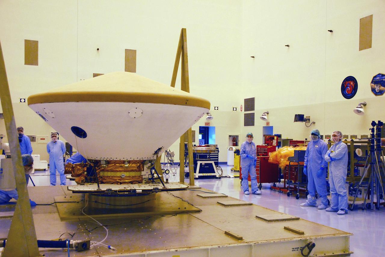 KENNEDY SPACE CENTER, FLA. --  The unwrapped Phoenix spacecraft is on display in the Payload Hazardous Servicing Facility.  The Phoenix mission is the first project in NASA's first openly competed program of Mars Scout missions. Phoenix will land in icy soils near the north polar permanent ice cap of Mars and explore the history of the water in these soils and any associated rocks, while monitoring polar climate. Landing is planned in May 2008 on arctic ground where a mission currently in orbit, Mars Odyssey, has detected high concentrations of ice just beneath the top layer of soil. It will serve as NASA's first exploration of a potential modern habitat on Mars and open the door to a renewed search for carbon-bearing compounds, last attempted with NASA’s Viking missions in the 1970s. A stereo color camera and a weather station will study the surrounding environment while the other instruments check excavated soil samples for water, organic chemicals and conditions that could indicate whether the site was ever hospitable to life. Microscopes can reveal features as small as one one-thousandth the width of a human hair. Launch of Phoenix aboard a Delta II rocket is targeted for Aug. 3 from Cape Canaveral Air Force Station in Florida.  Photo credit: NASA/George Shelton