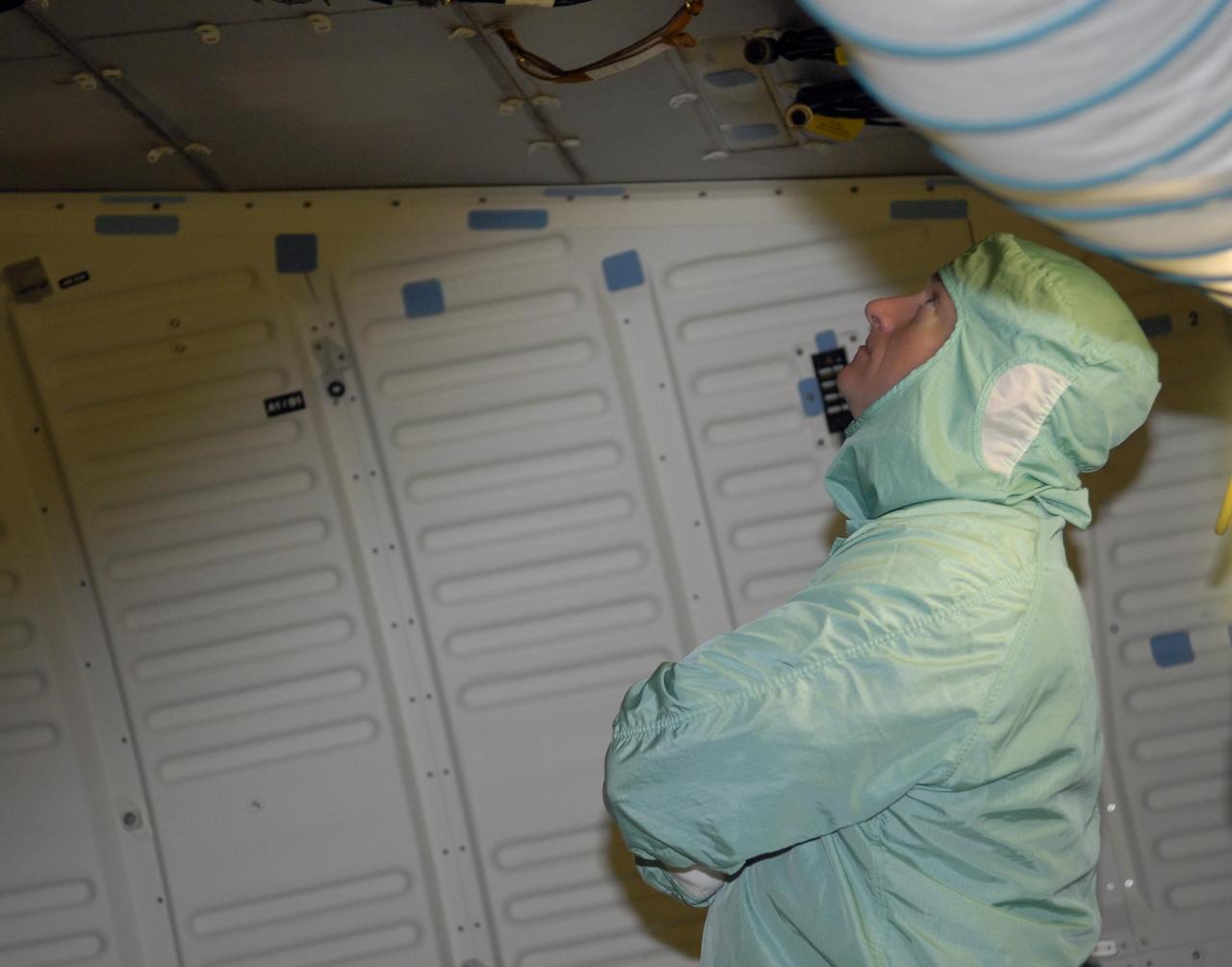 KENNEDY SPACE CENTER, FLA. --   During crew equipment interface test activities at KSC, STS-118 Commander Scott Kelly checks out the midbody of orbiter Endeavour, which is in Orbiter Processing Facility bay 3. The STS-118 mission will be delivering the third starboard truss segment, the ITS S5, to the International Space Station, as well as the SPACEHAB single cargo module filled with supplies and equipment.  Launch aboard Space Shuttle Endeavour is targeted for Aug. 9.   Photo credit: NASA/Kim Shiflett