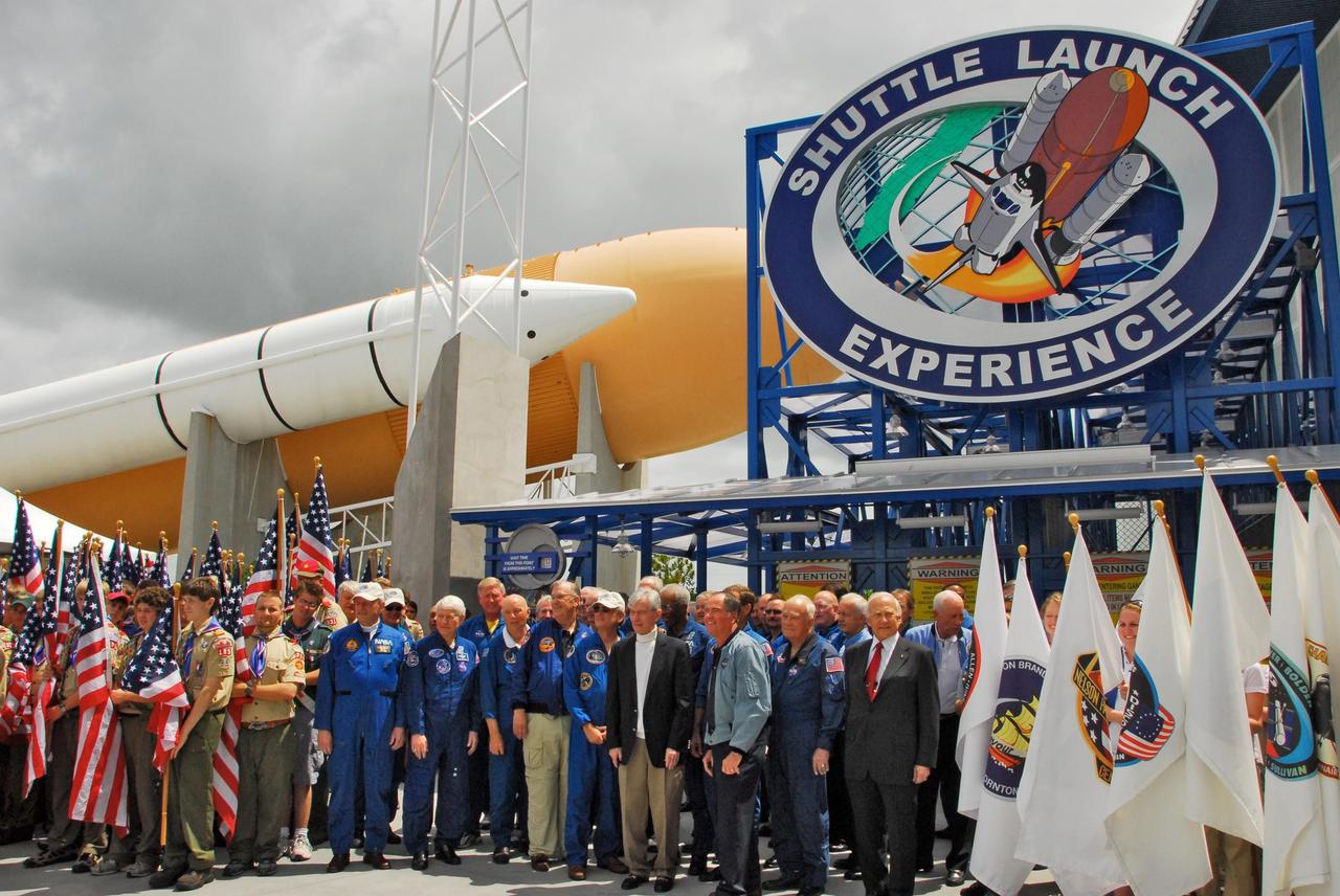 KENNEDY SPACE CENTER, FLA. -- Many former astronauts gather at the opening of the newest attraction at Kennedy Space Center's Visitor Complex, the Shuttle Launch Experience. In front are John Young (left) and Bob Crippen. The attraction includes a simulated launch with the sights, sounds and sensations of launching into space. Find out more about the Visitor Complex and the Shuttle Launch Experience at <b>http://www.kennedyspacecenter.com/visitKSC/attractions/index.asp</b>. Photo credit: NASA/George Shelton